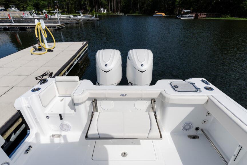 Manufacturer Provided Image: 2026 Sea Hunt Gamefish 30 Coffin Box boat at dock, featuring dual engines.