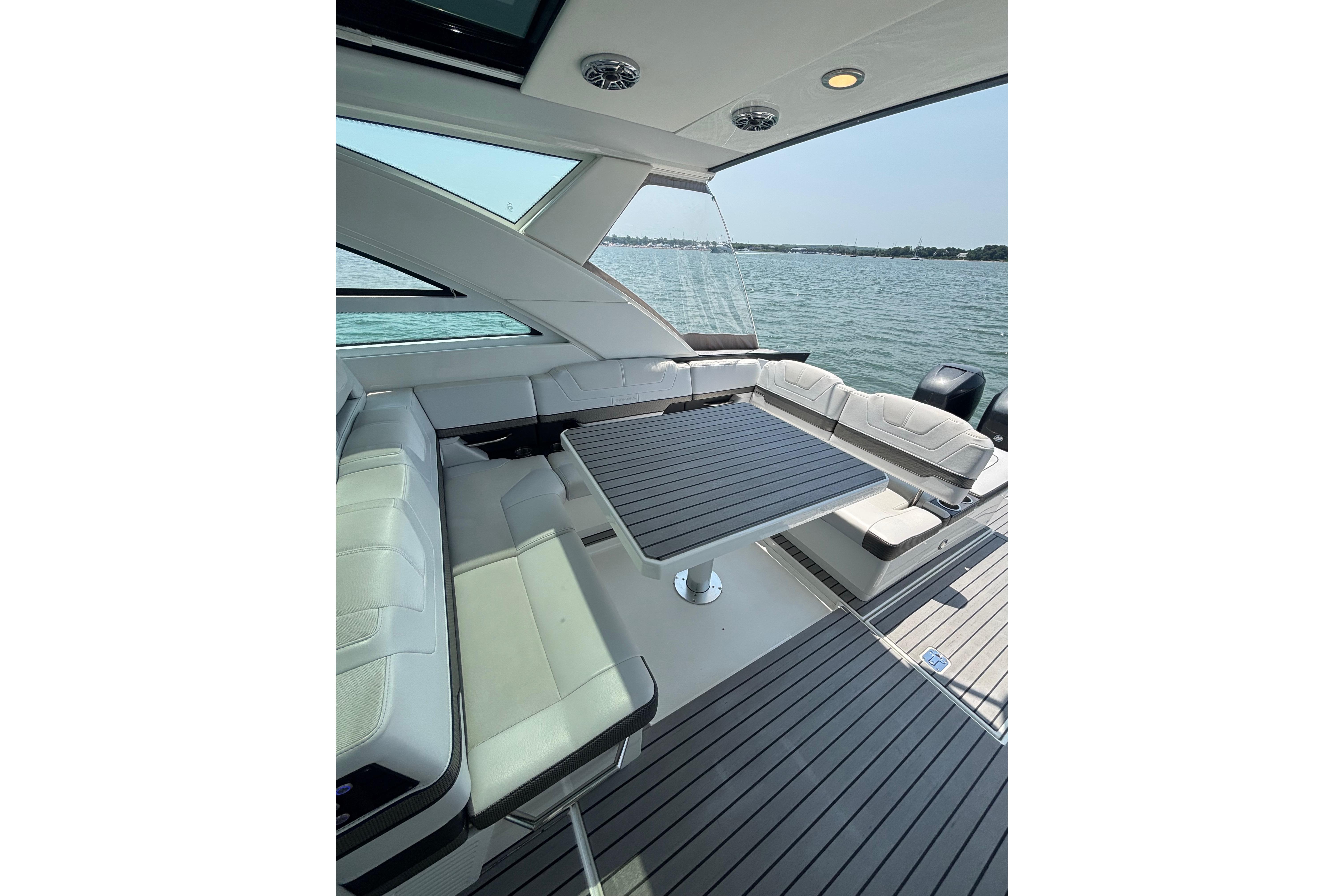 Luxurious seating area on a 2019 Formula 430 Super Sport Crossover yacht.