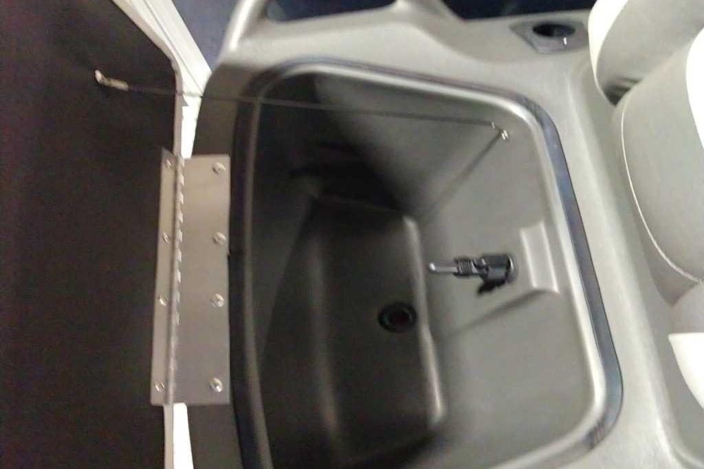 Open storage compartment in 2026 Sun Tracker Bass Buggy 18 DLX boat.