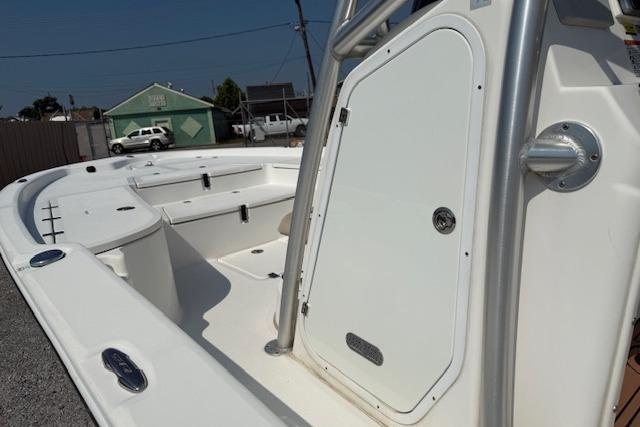 2016 Sea Fox 240 Viper boat interior with storage compartments and seating.