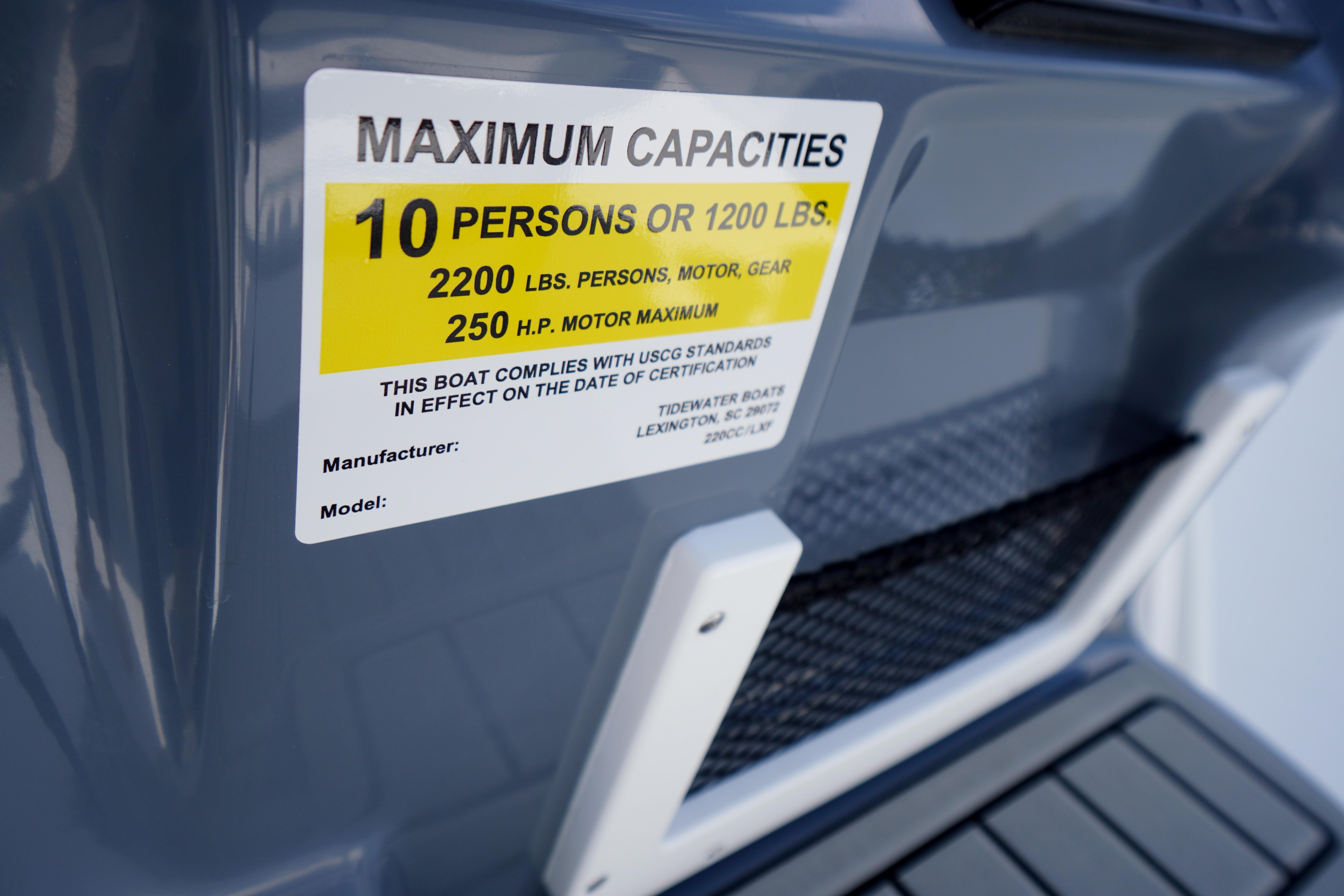 Sticker on 2027 Tidewater 220 CC Adventure showing maximum capacities and compliance details.