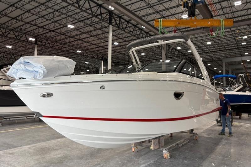2025 Cobalt R6 boat in a factory setting, showcasing sleek design and modern features.