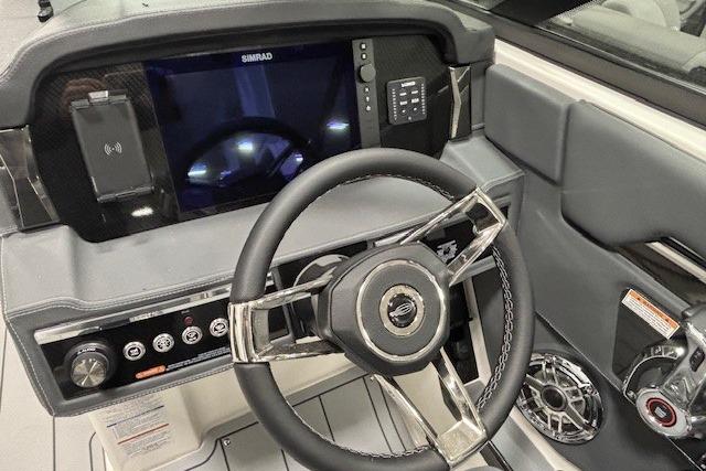 2026 Chaparral SSX 8 boat dashboard with steering wheel and control panel.