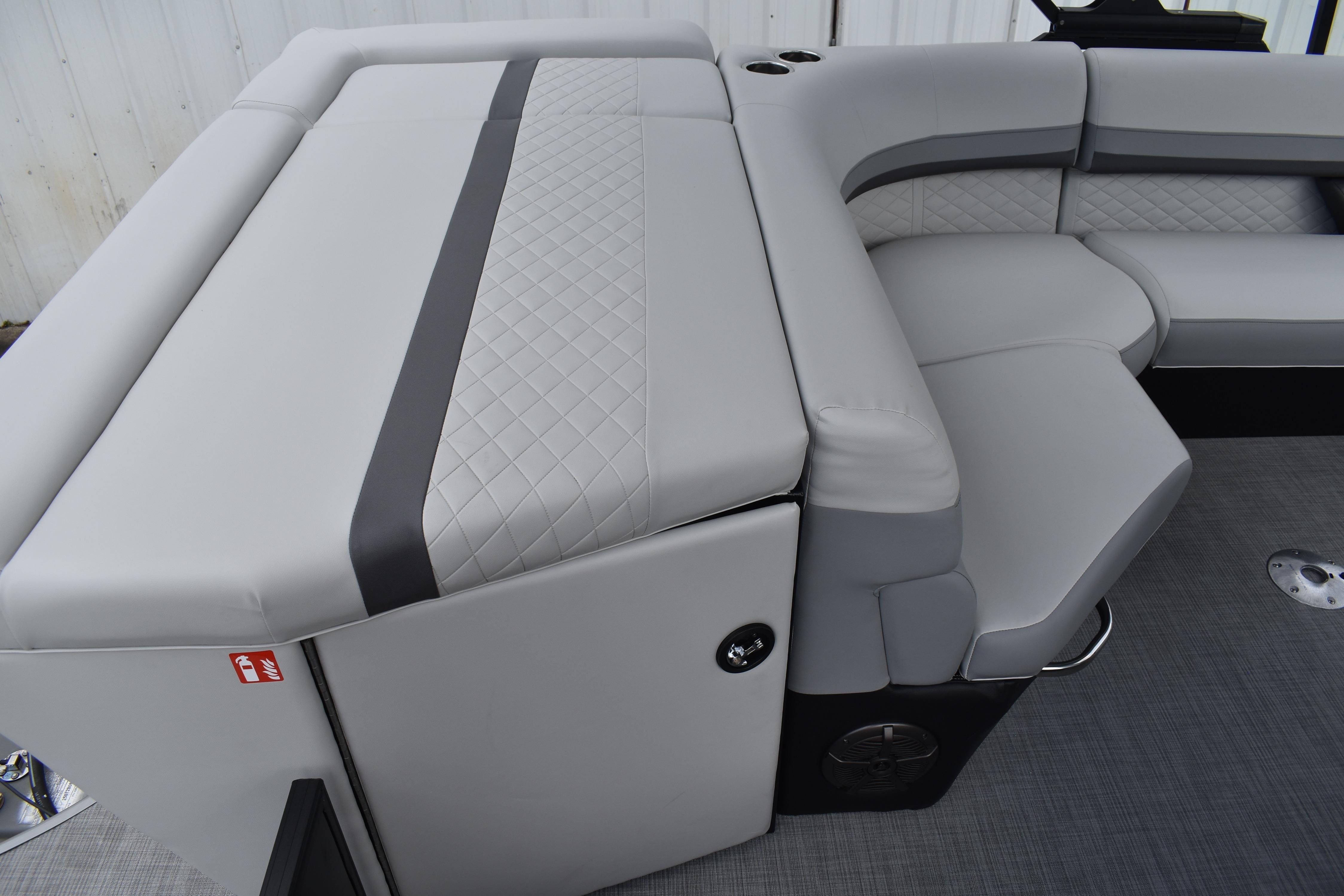 Luxurious seating on 2026 Lowe SS 210 pontoon boat with quilted upholstery.