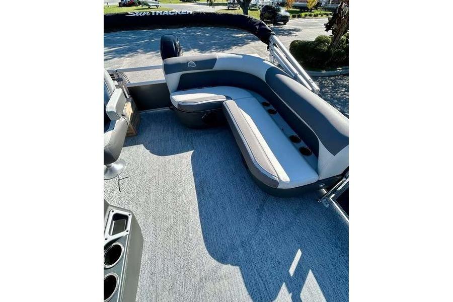 2026 Sun Tracker Bass Buggy 16 XL Select pontoon boat interior with cushioned seating.