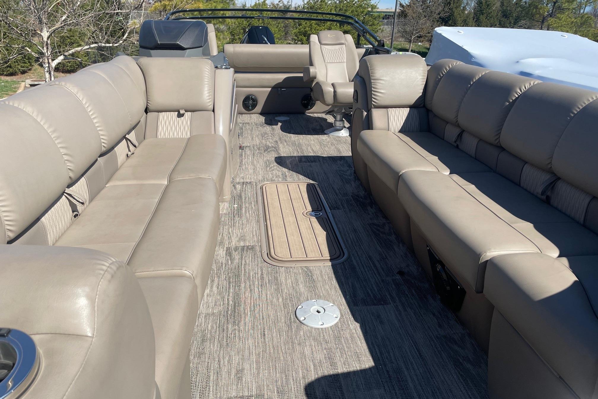 2024 Ranger 2500LS boat interior with beige seating and spacious layout.