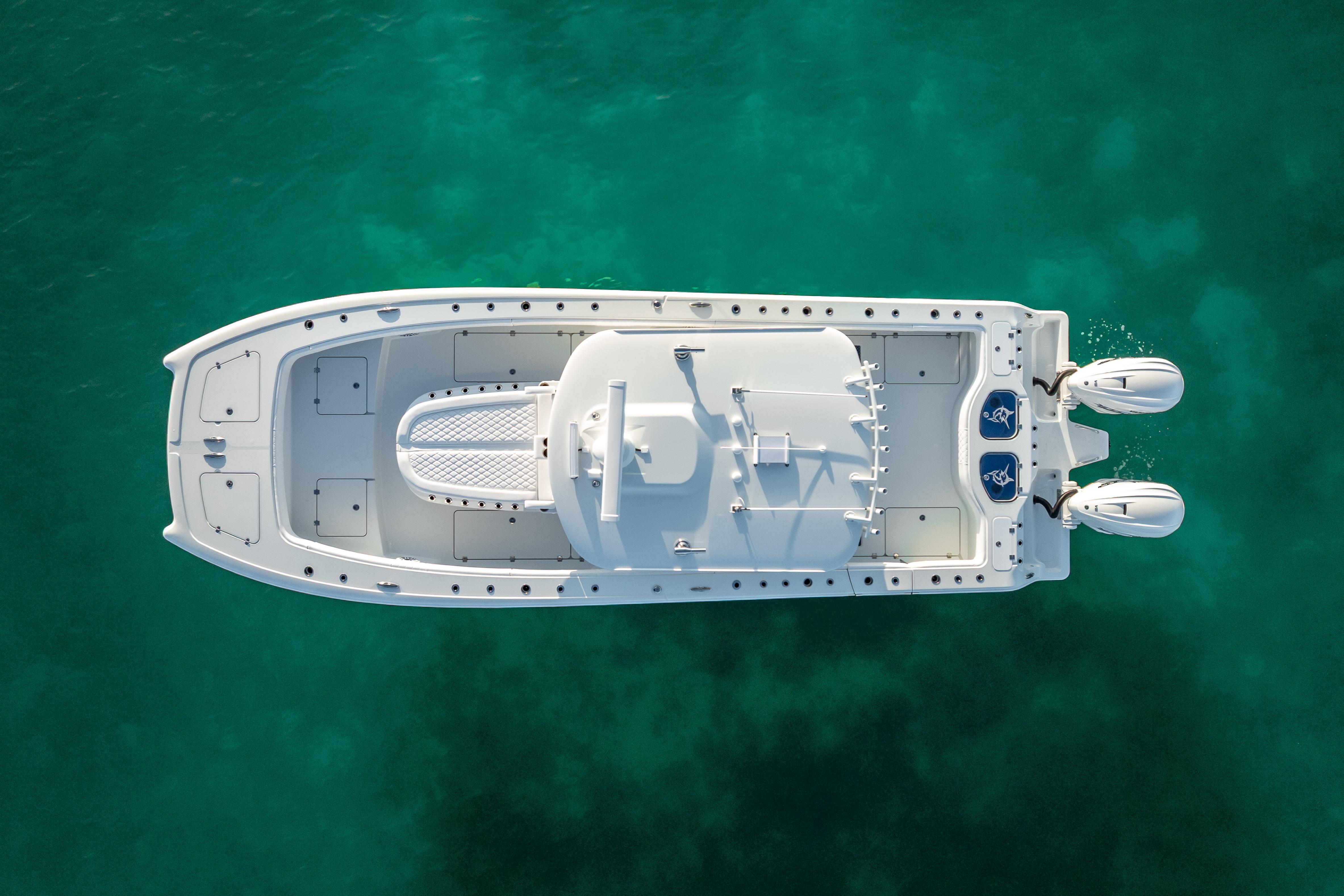 Aerial view of 2026 Freeman 35 boat on clear turquoise water.