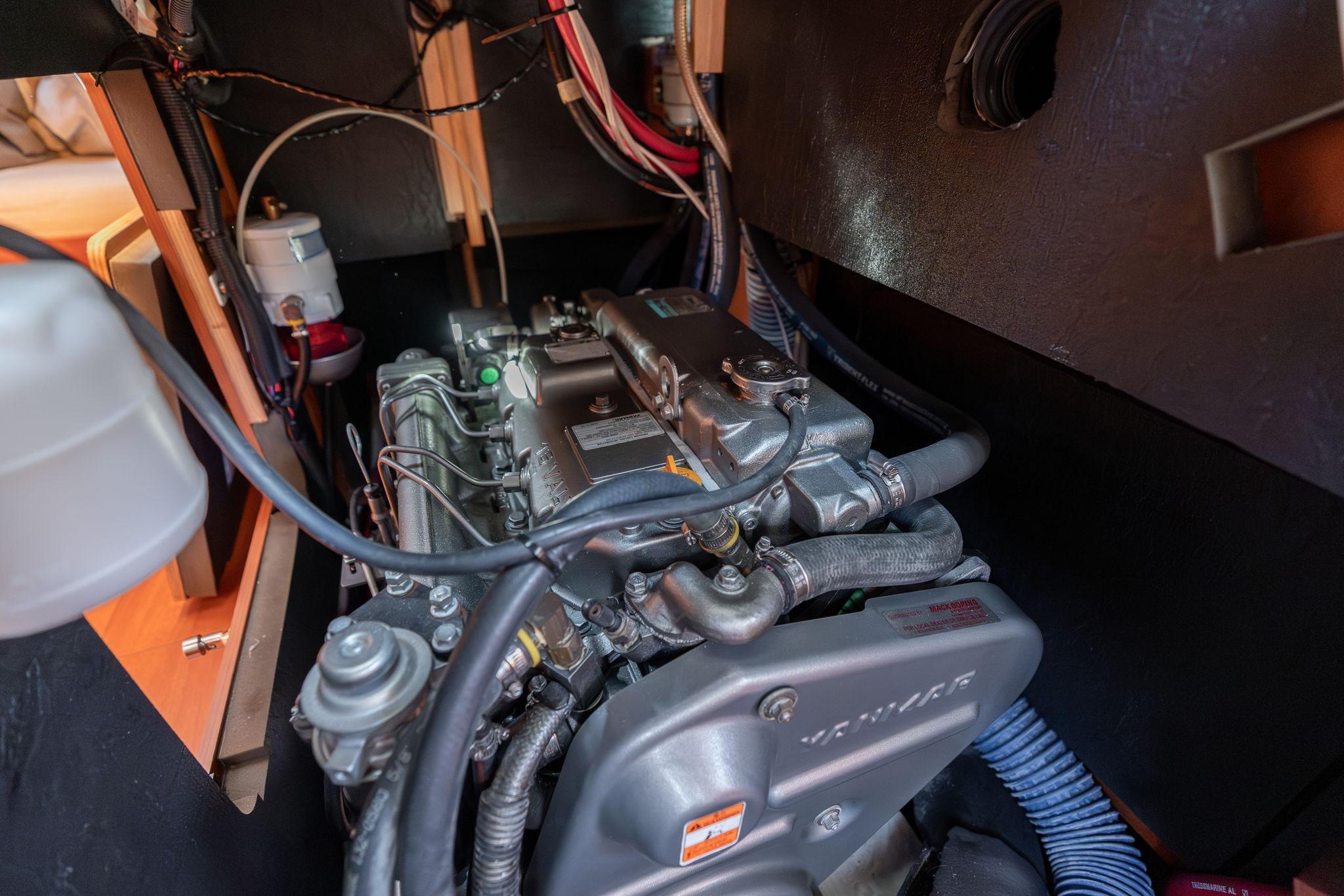 Engine compartment of a 2013 Beneteau Oceanis 50 sailboat, featuring a Yanmar engine.