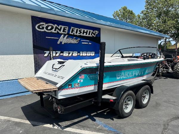 1992 Correct Craft Ski Nautique boat on trailer, parked outside Gone Fishin' Marine.