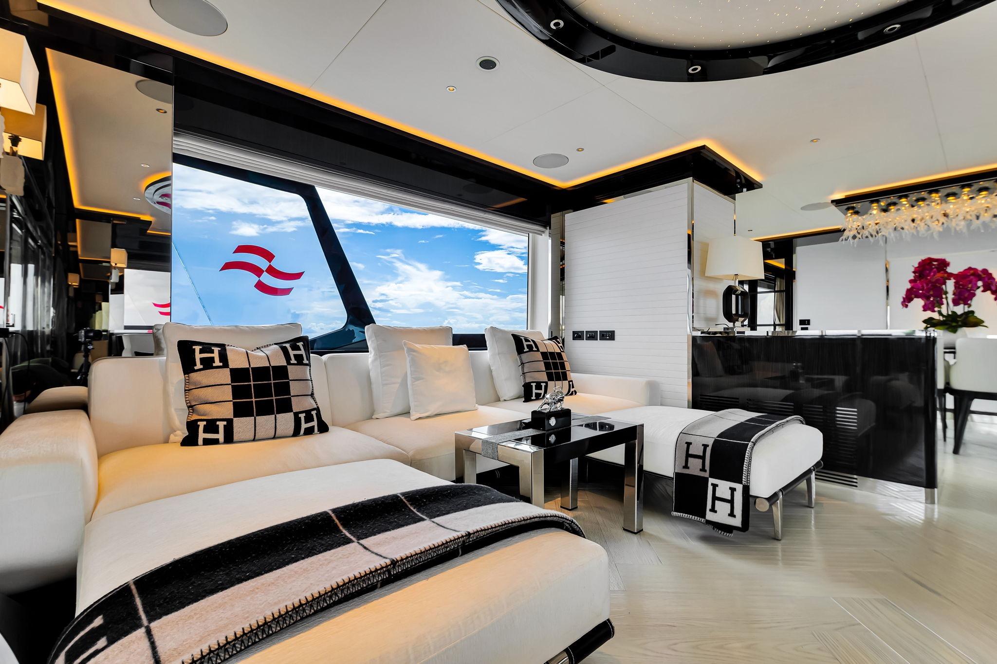 Luxurious interior of 2021 Sirena 88 yacht with elegant seating and modern decor.