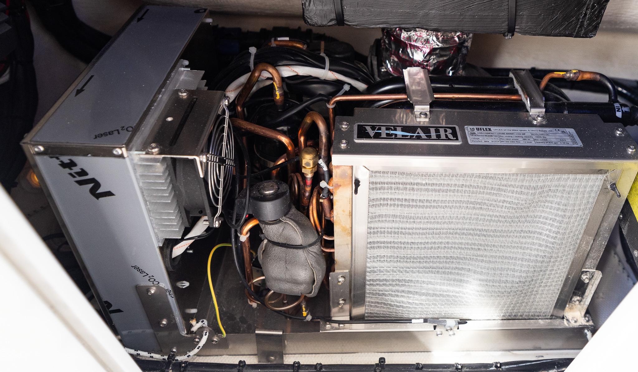 Engine room of 2025 Blackwater 43 Sportfish with Velair air conditioning unit.