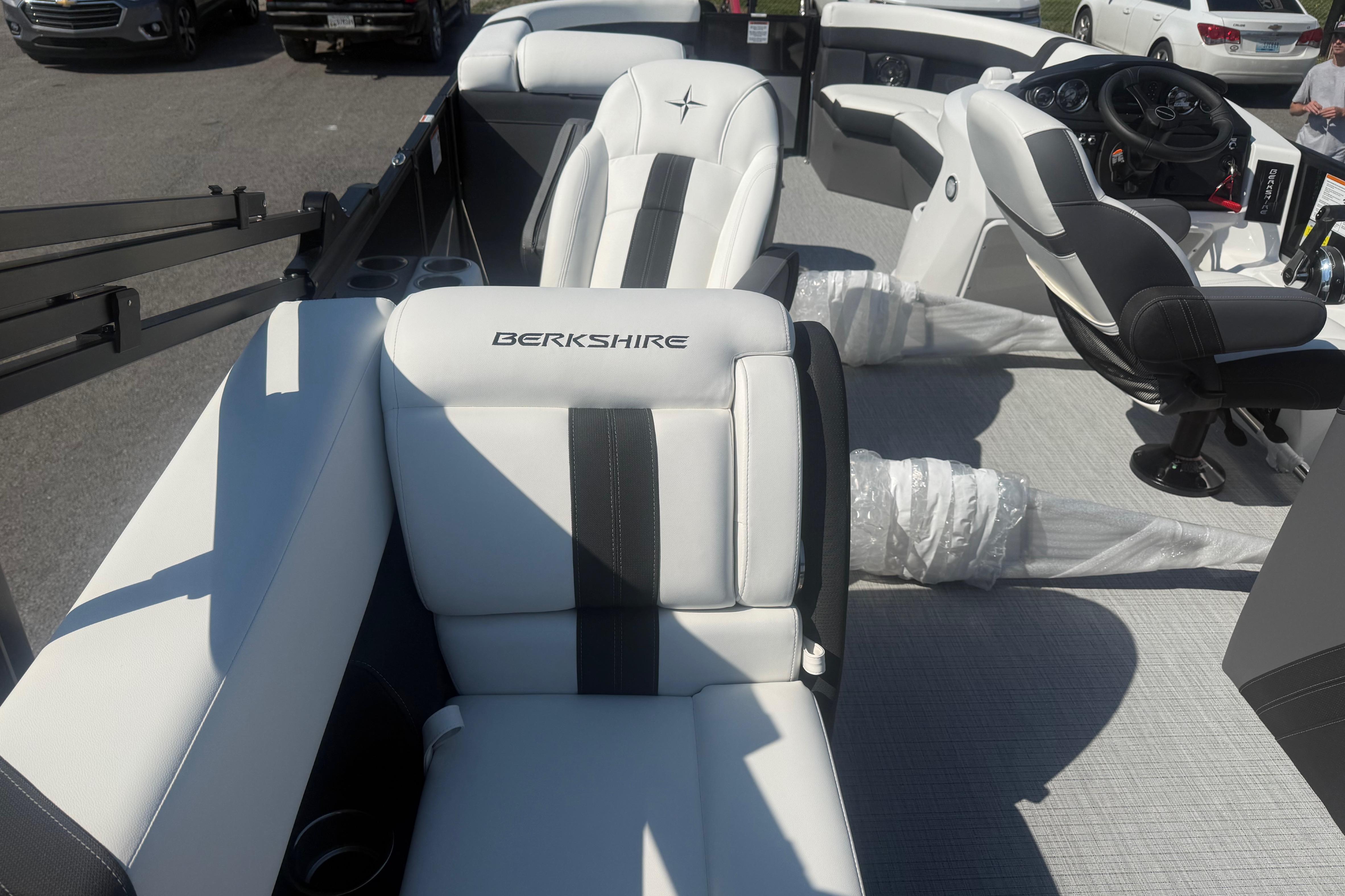 2026 Berkshire CTS Series 24RFX CTS boat interior with white and black seating.