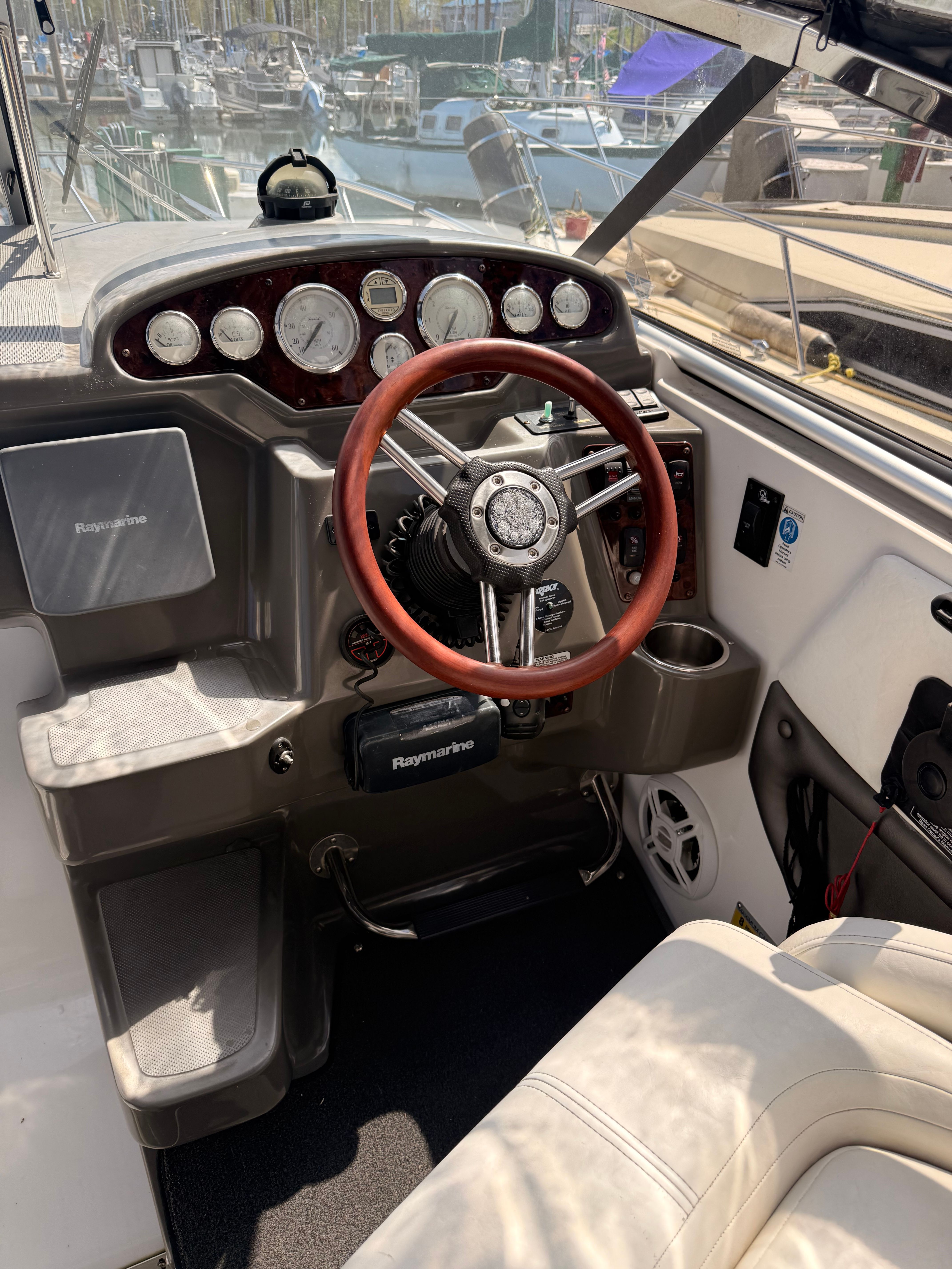 Helm of a 2008 Regal 2565 Window Express boat.