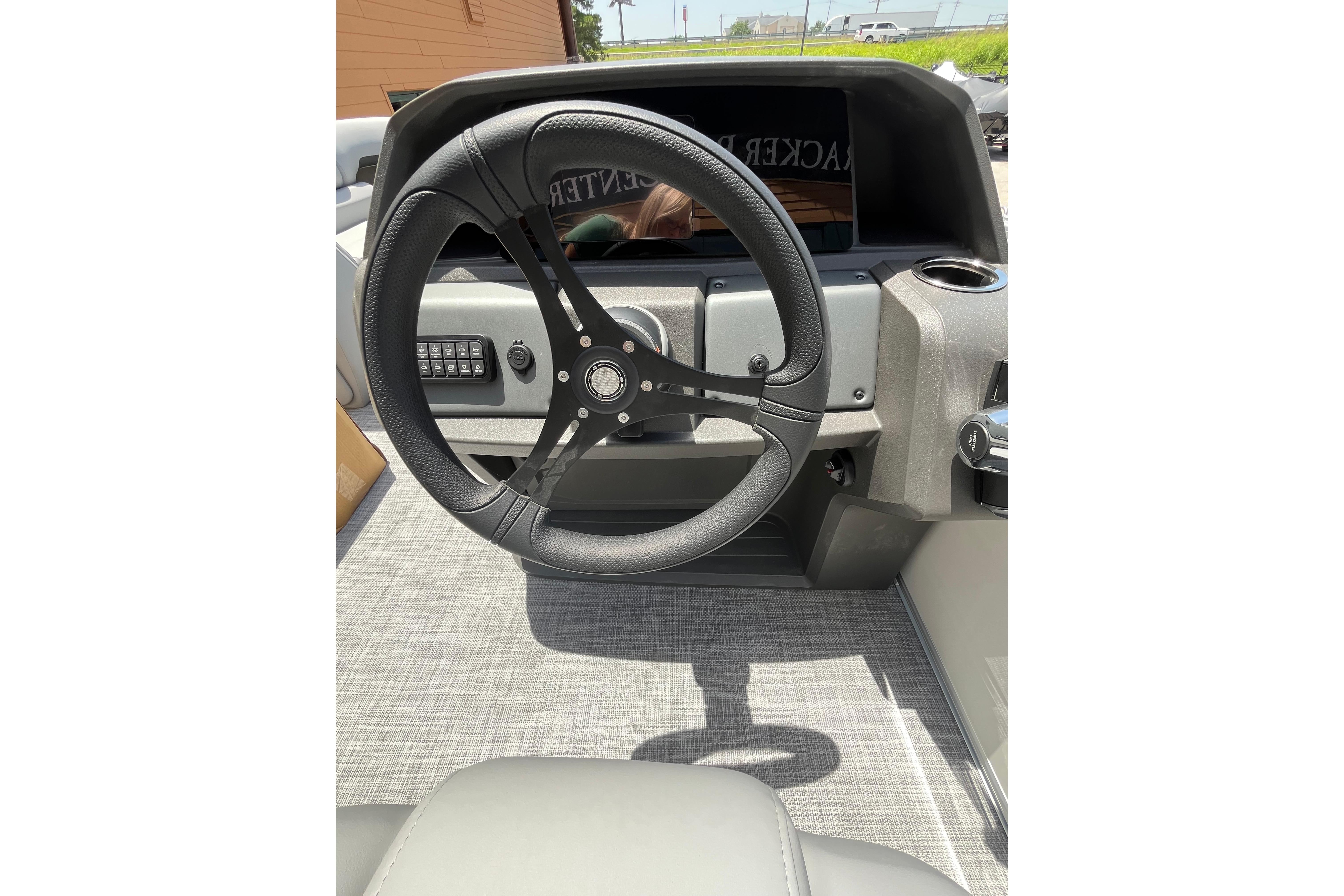 Steering wheel of 2026 Sun Tracker Party Barge 20 DLX pontoon boat.