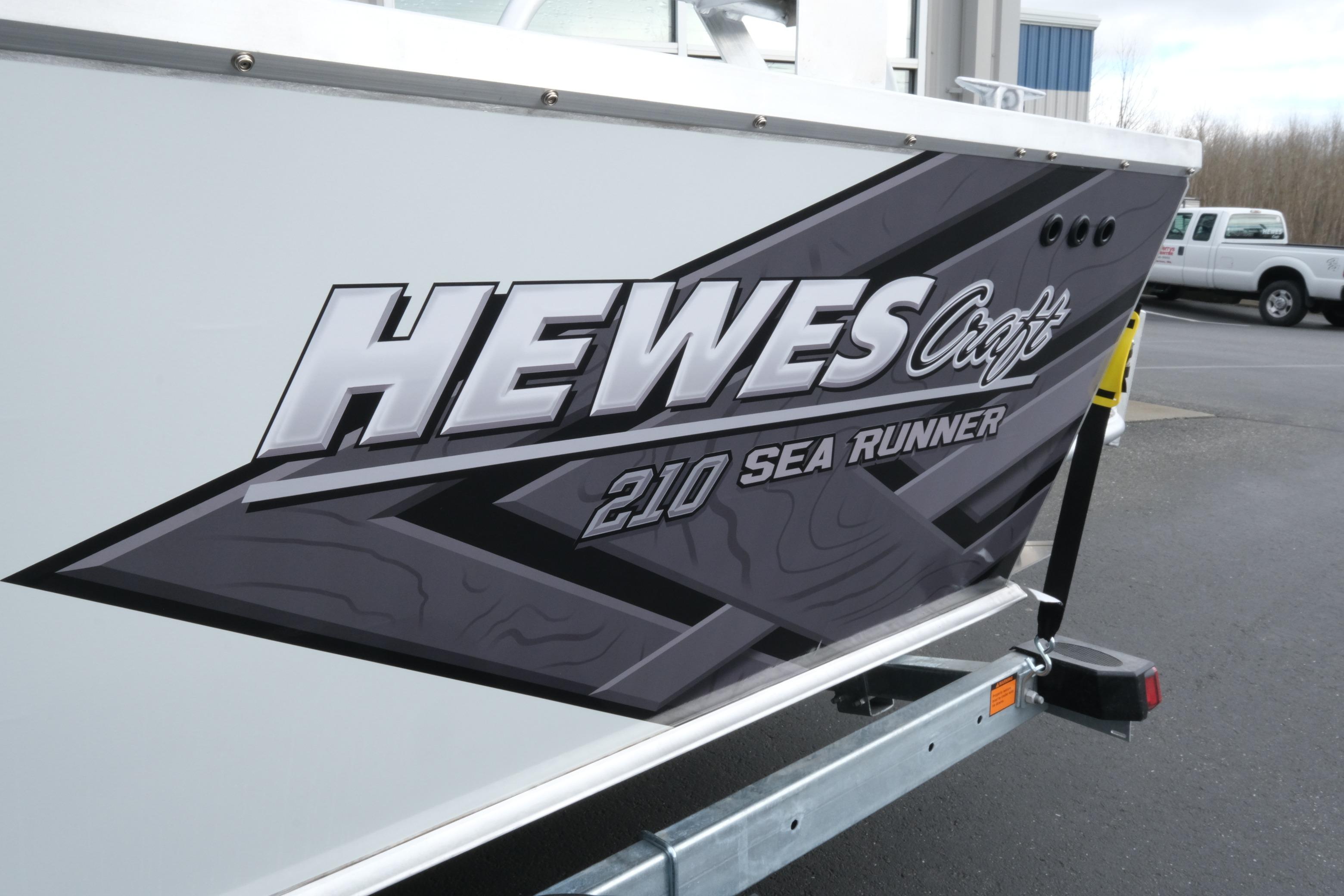 2026 Hewescraft 210 Sea Runner ET Hardtop boat decal on trailer.