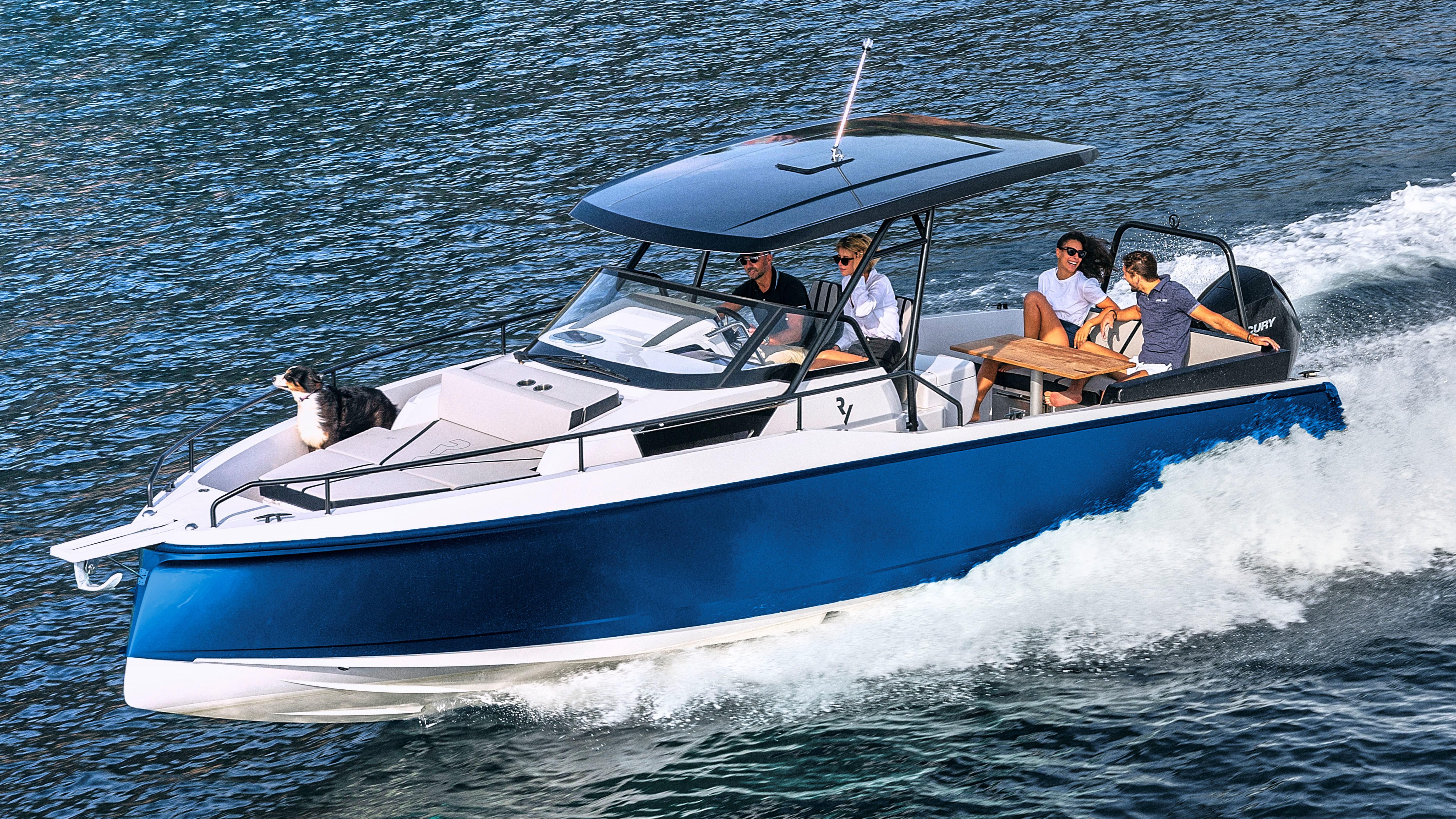 2023 RYCK 280 boat cruising with passengers and a dog on the water.