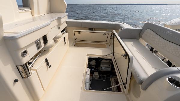 2025 Scout 425 LXF boat interior with open storage compartments, showcasing luxury and functionality.