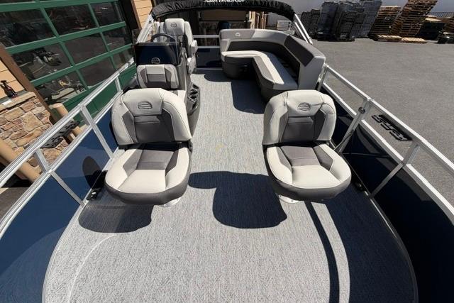 2026 Sun Tracker Bass Buggy 16 XL Select pontoon boat interior with seating and helm.