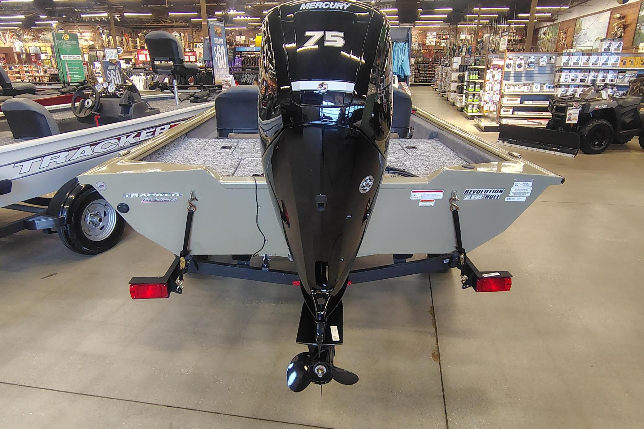 2026 Tracker Pro Team 175 Crappie Edition boat with Mercury 75 engine in showroom.