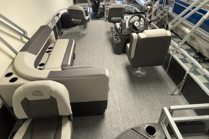 2026 Sun Tracker Bass Buggy 18 DLX interior with seating and steering console.