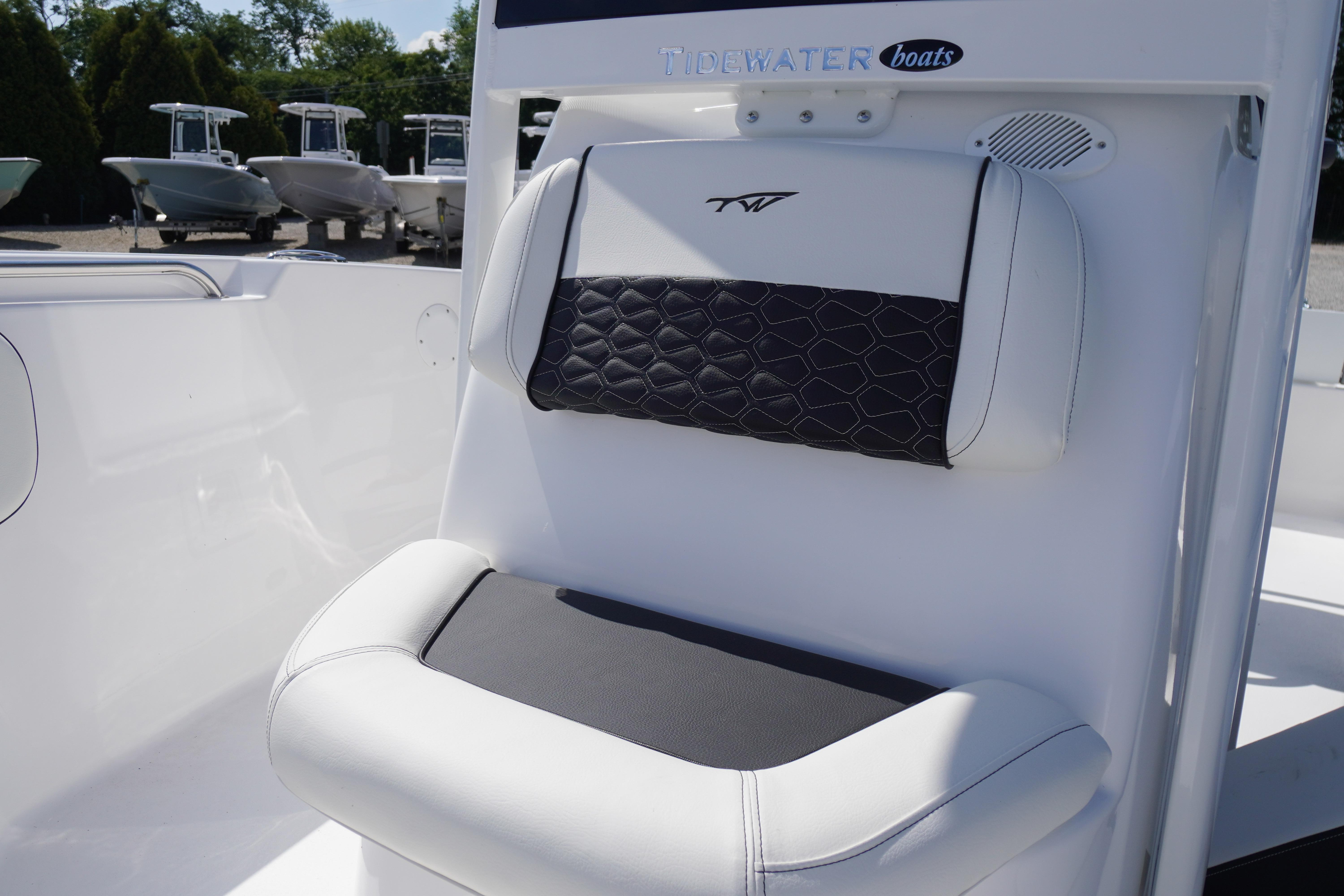 2026 Tidewater 220 CC Adventure boat seat with stylish black and white upholstery.