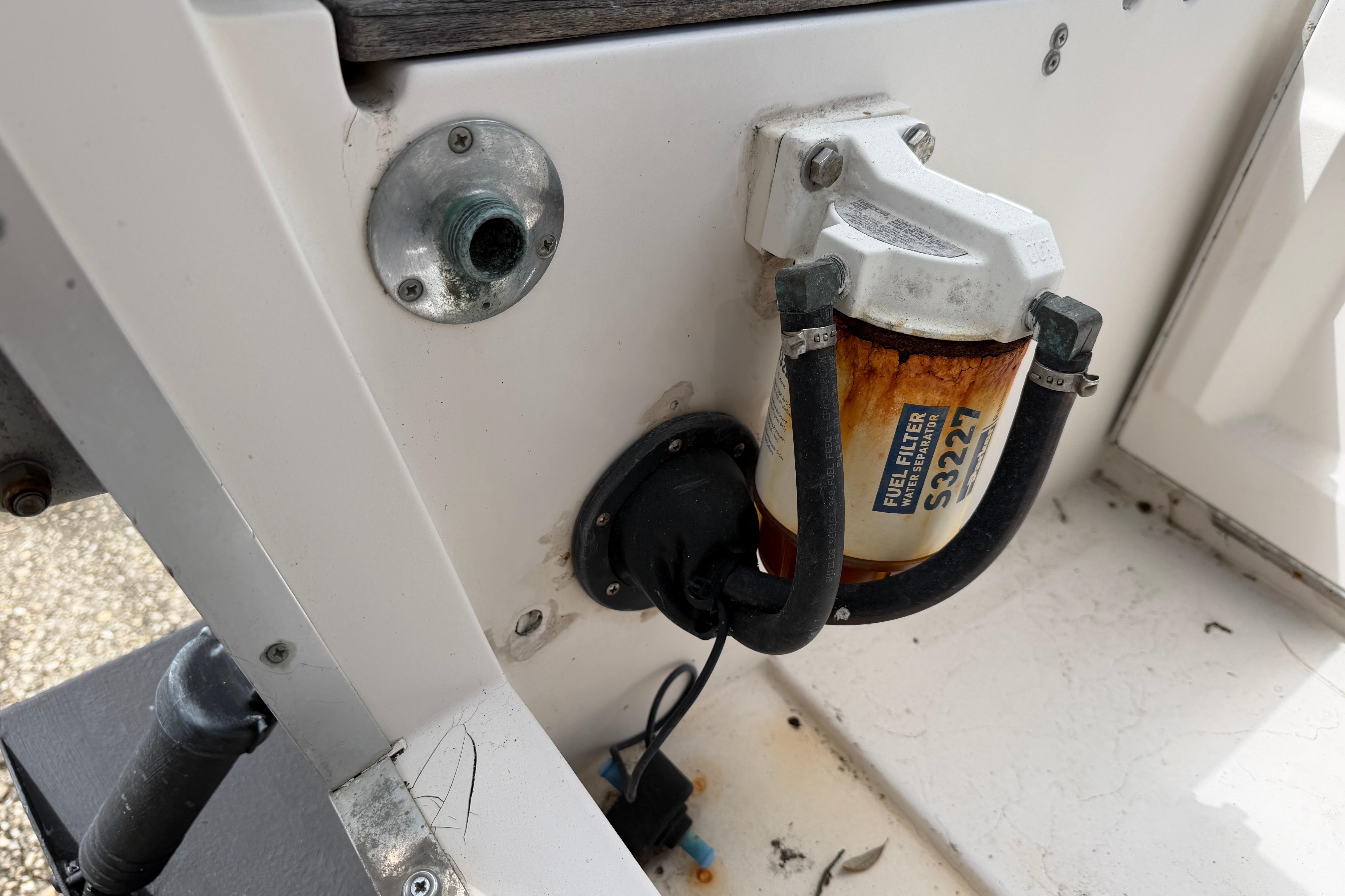 Fuel filter system on a 1987 Grady-White Seafarer 226 boat, featuring S3227 filter.