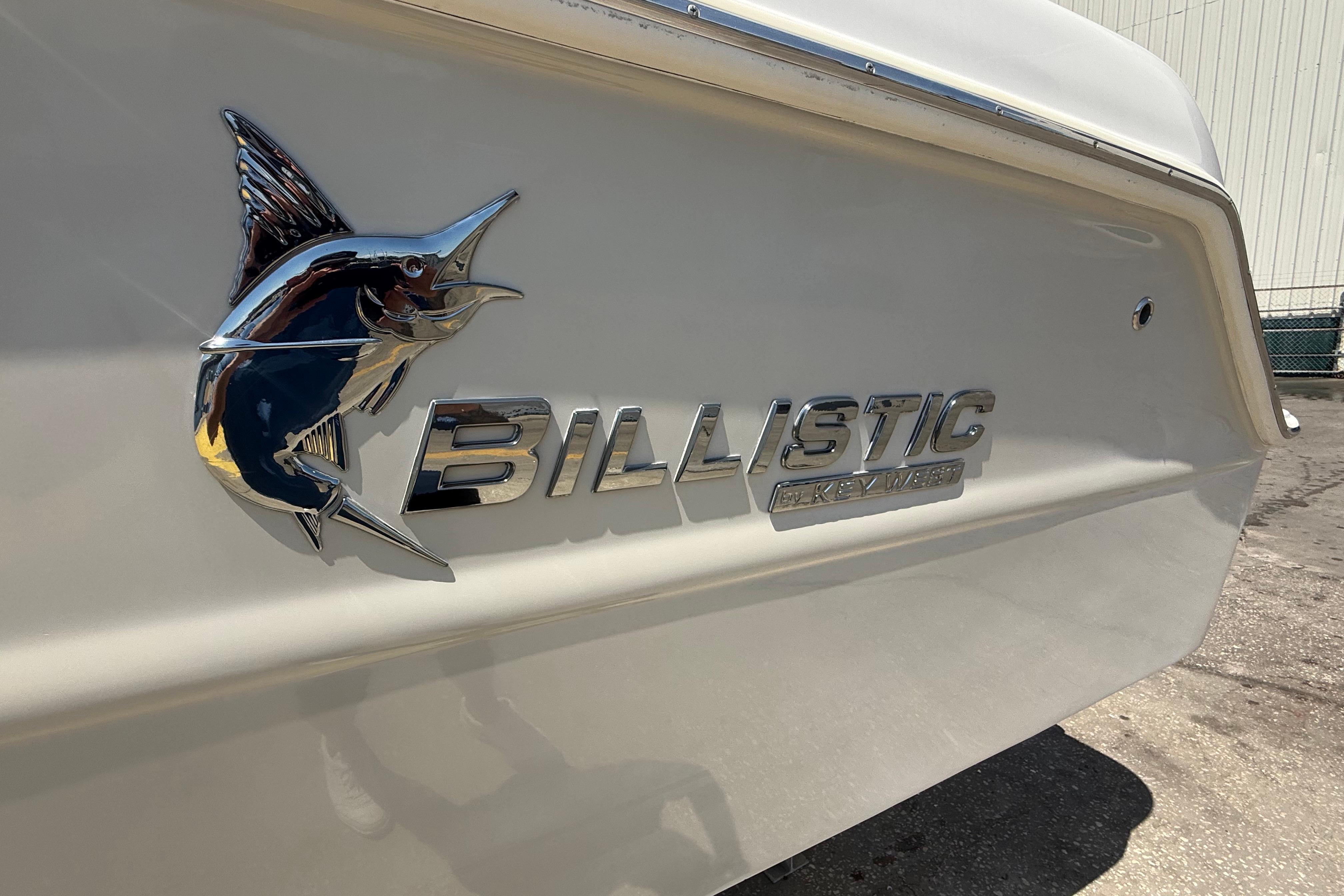 2019 Key West Billistic 281 Center Console boat emblem with marlin design.