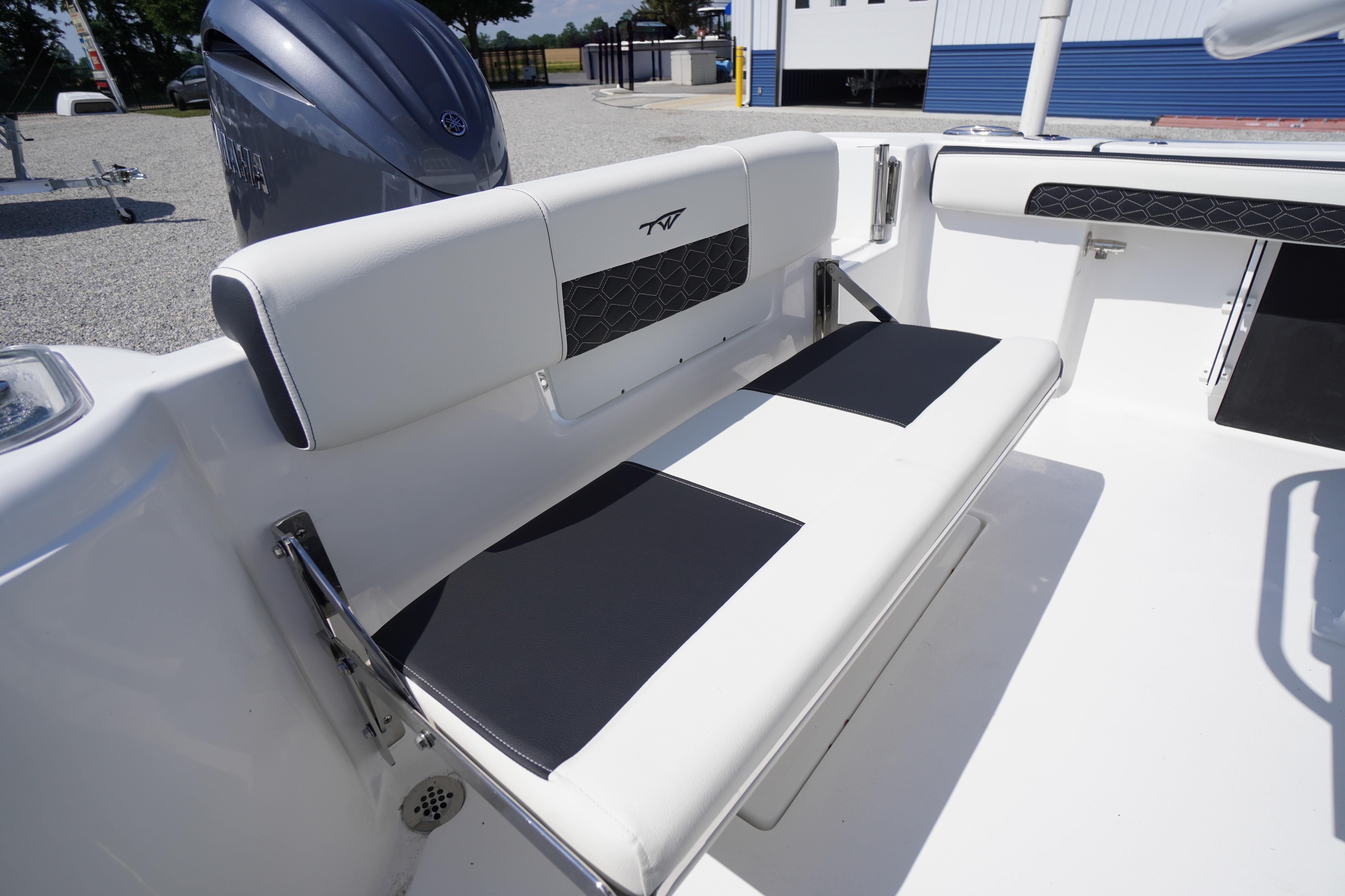 2026 Tidewater 220 CC Adventure boat interior with cushioned seating and modern design.