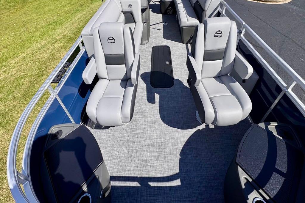 2026 Sun Tracker Sportfish 24 XP3 pontoon boat interior with gray seating and spacious layout.
