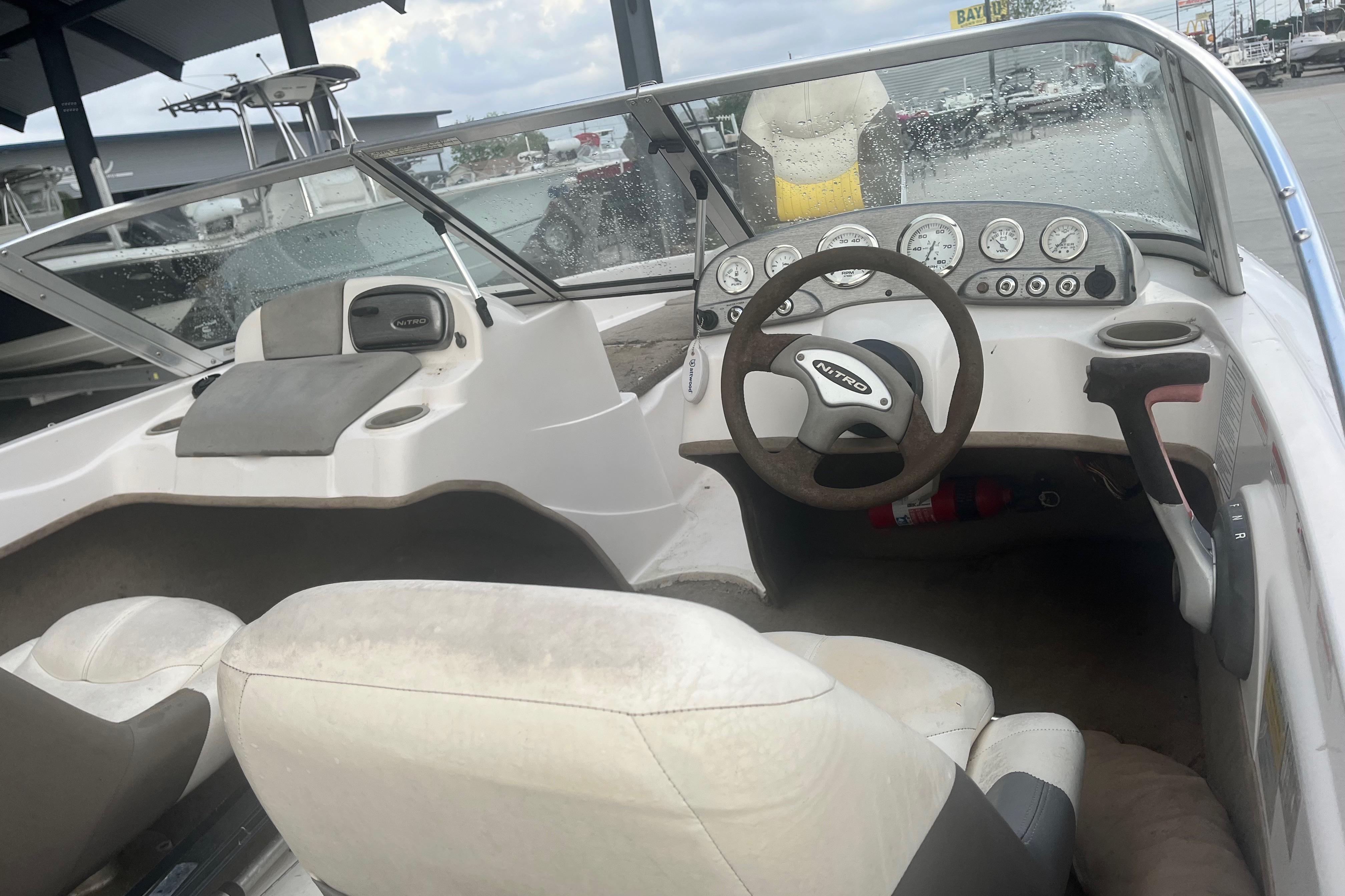 Interior of a 2006 Nitro 189 Sport boat with steering wheel and dashboard.