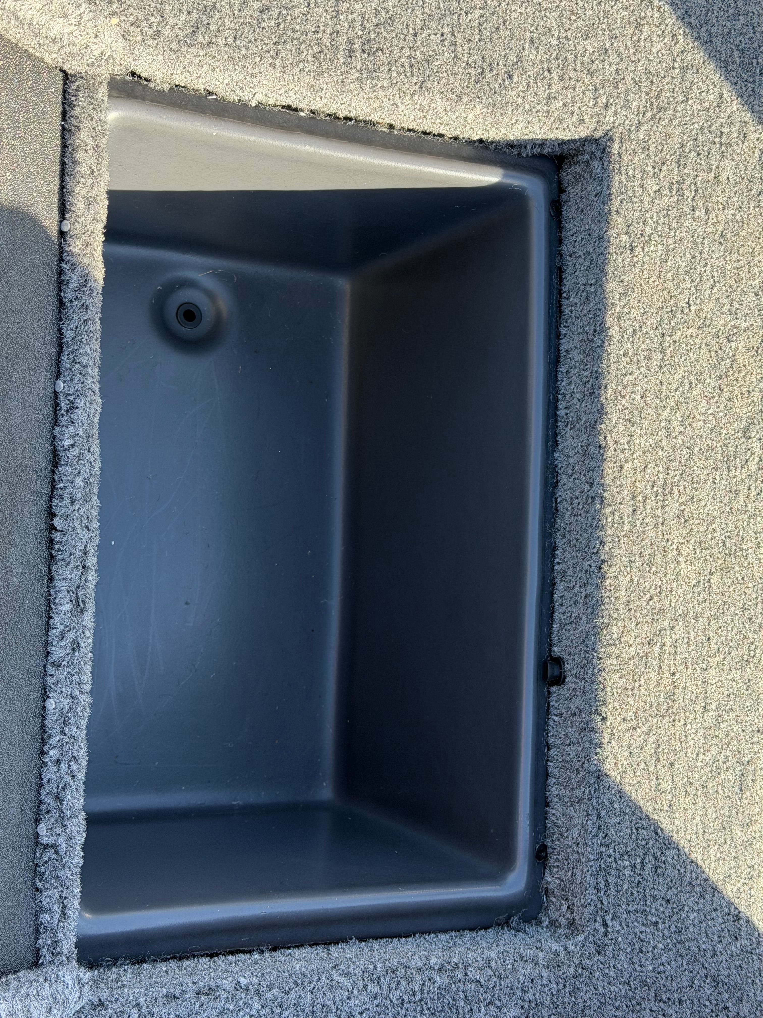 2024 Ranger RT188 boat compartment with grey carpet.