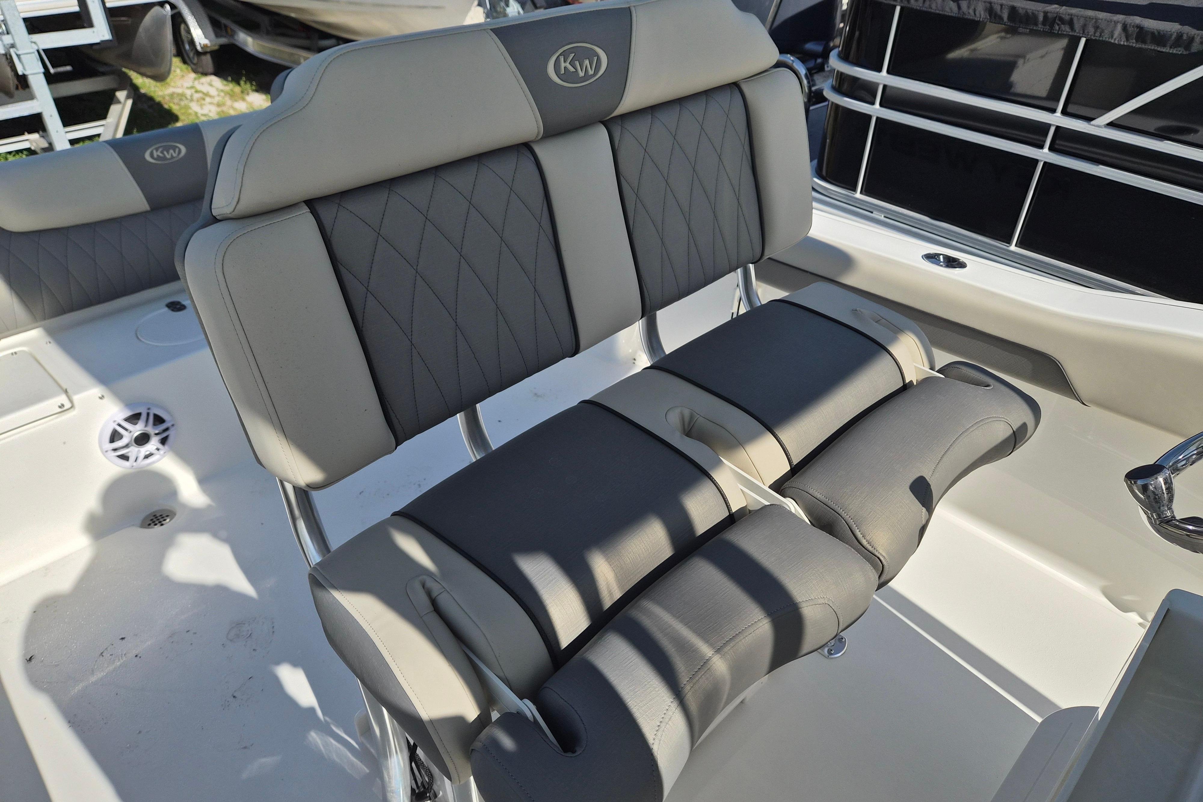 2026 Key West 239 FS boat seating with gray cushioned upholstery and sleek design.