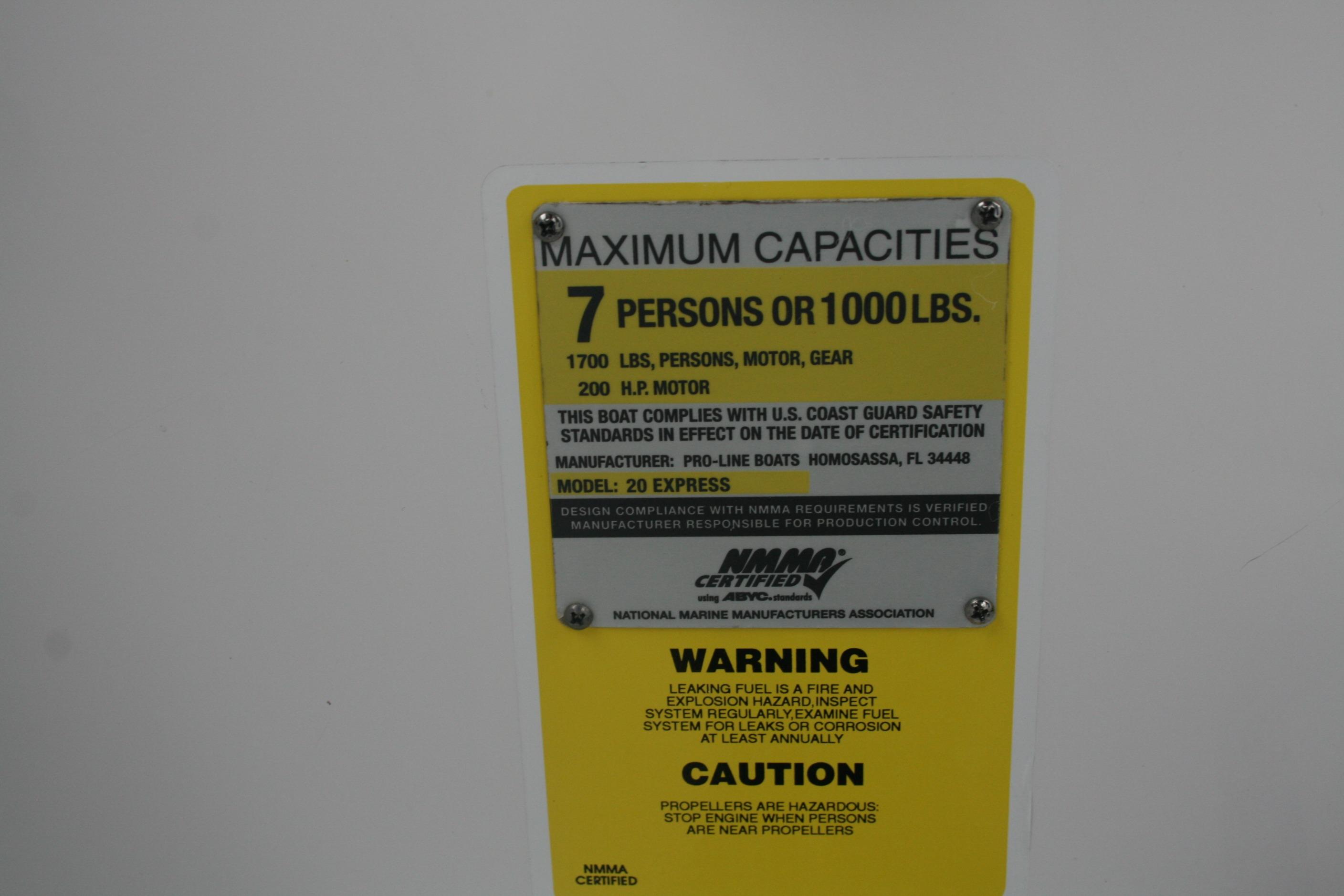2013 Pro-Line 20 Express capacity label: 7 persons or 1000 lbs, 200 HP motor.