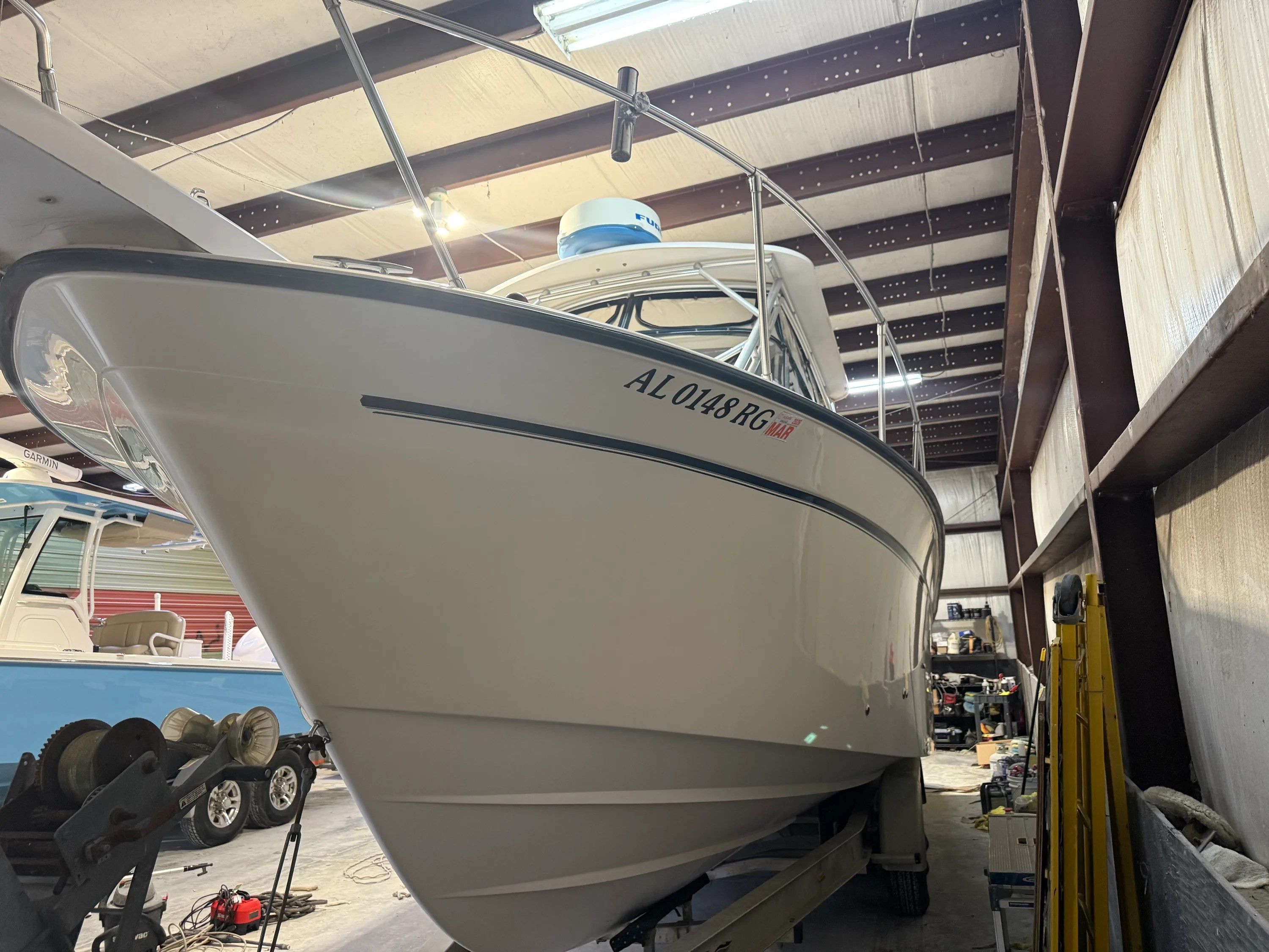 2002 Grady-White Marlin 300 boat in storage facility.