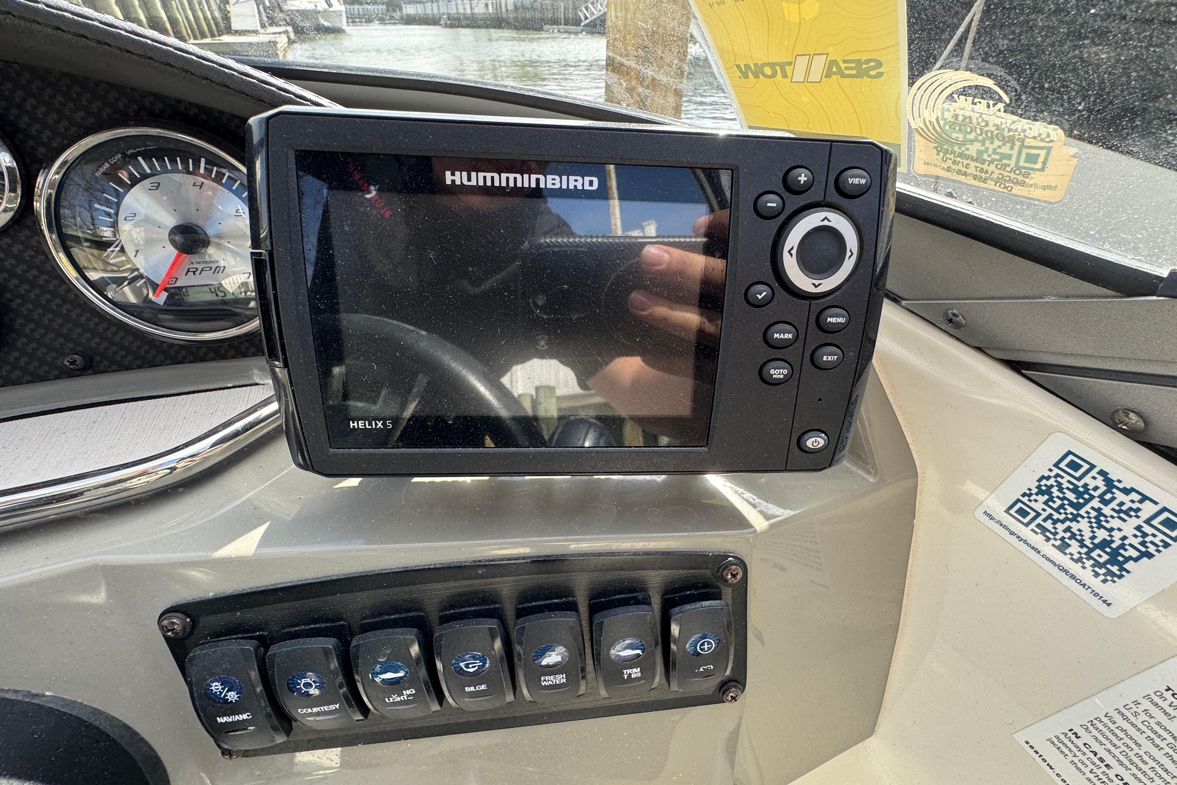 Dashboard of a 2019 Stingray 204 LR boat with Humminbird Helix 5 GPS.