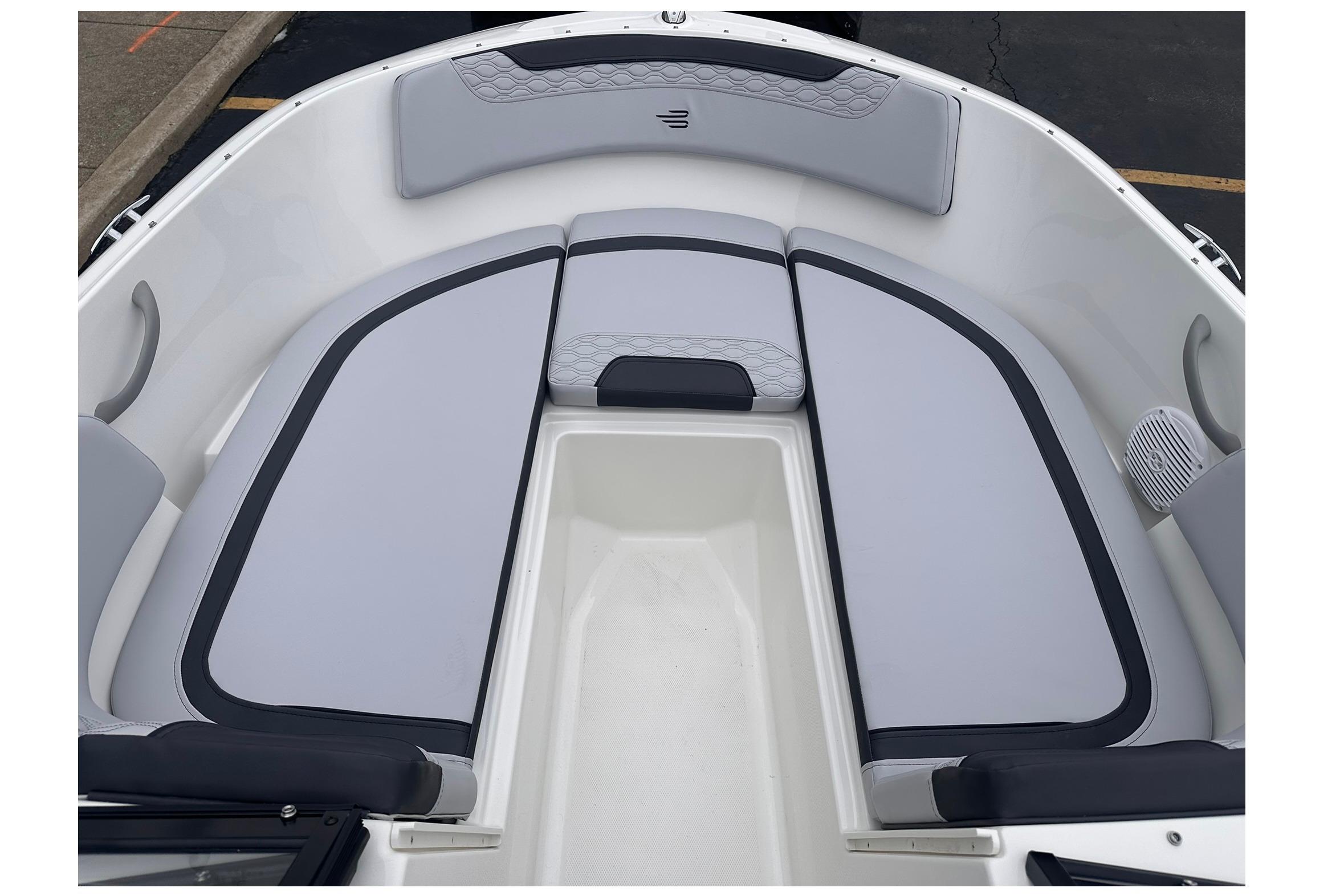 2026 Bayliner M17 boat interior with cushioned seating and modern design.