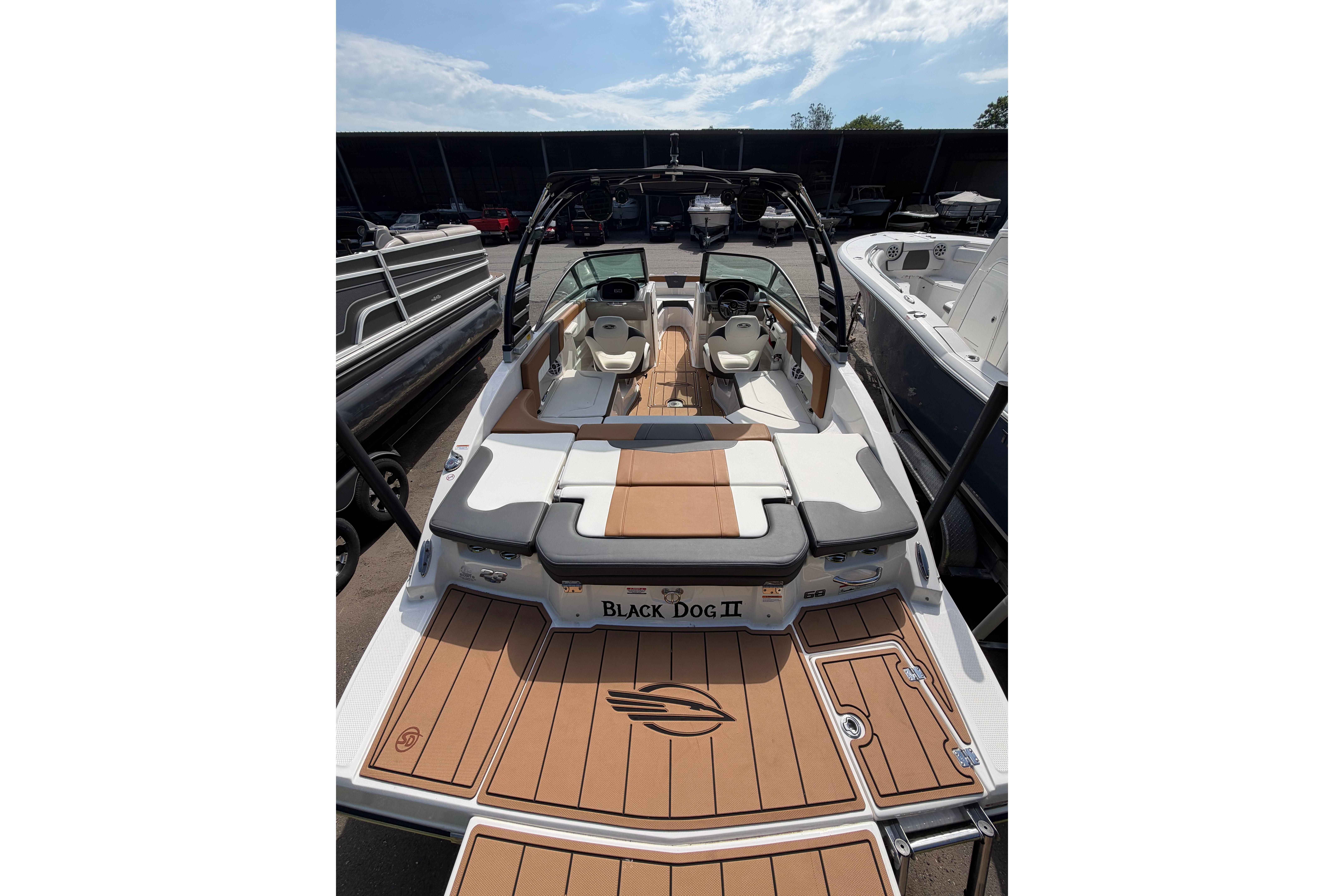 2025 Chaparral 230 SSi boat with sleek interior and stylish deck design.