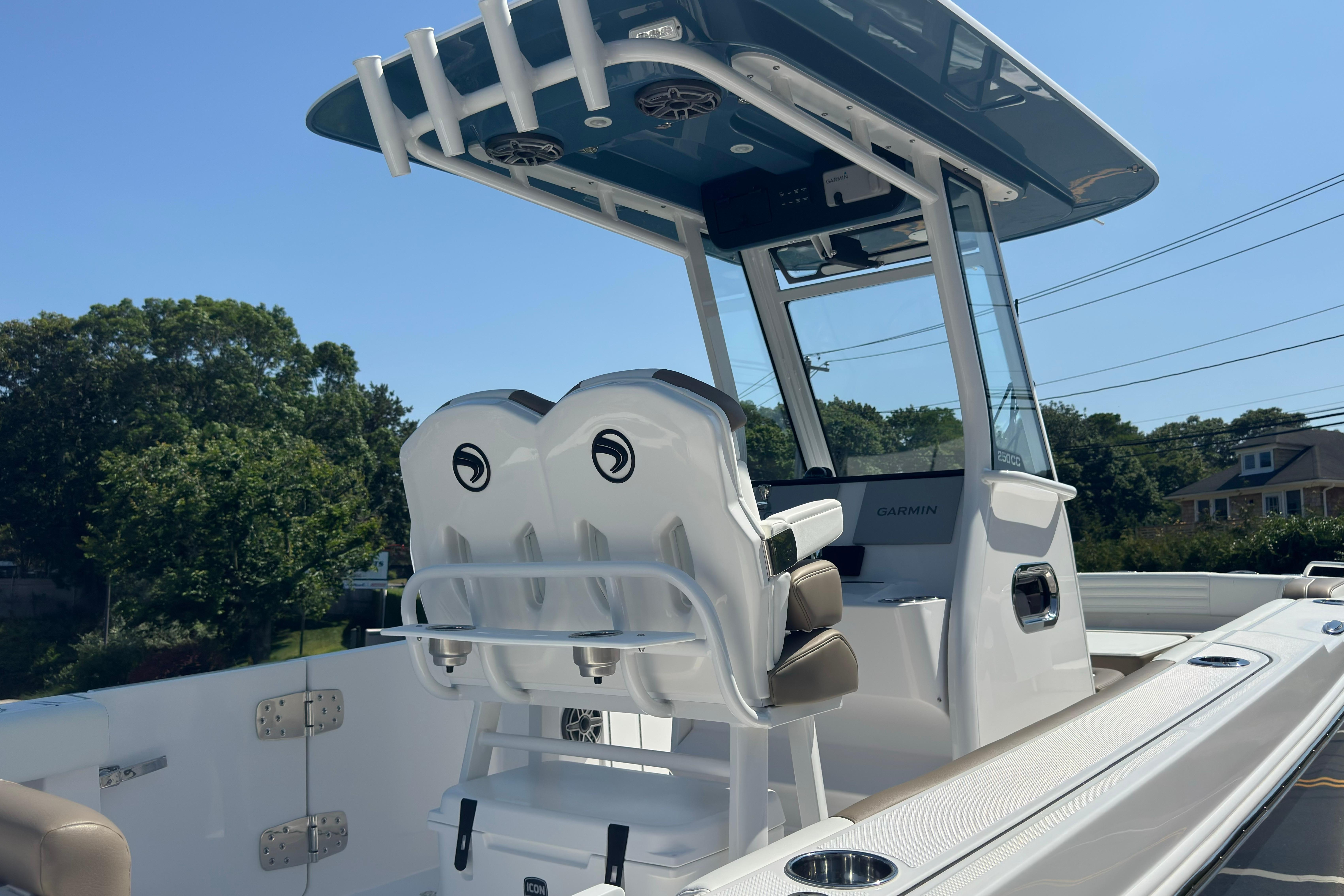 2026 Edgewater 250CC boat with modern helm and seating, featuring Garmin electronics.