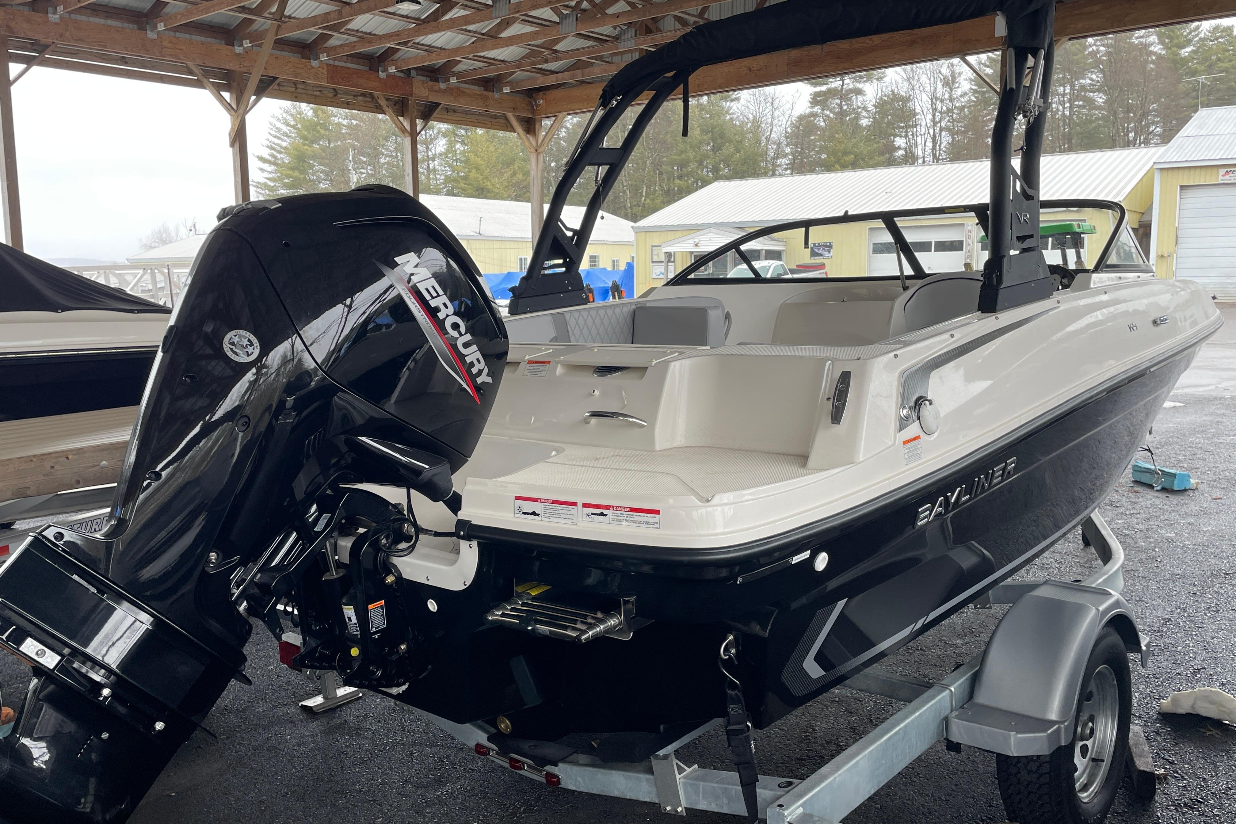 2026 Bayliner VR4 Bowrider OB with Mercury outboard engine on trailer.