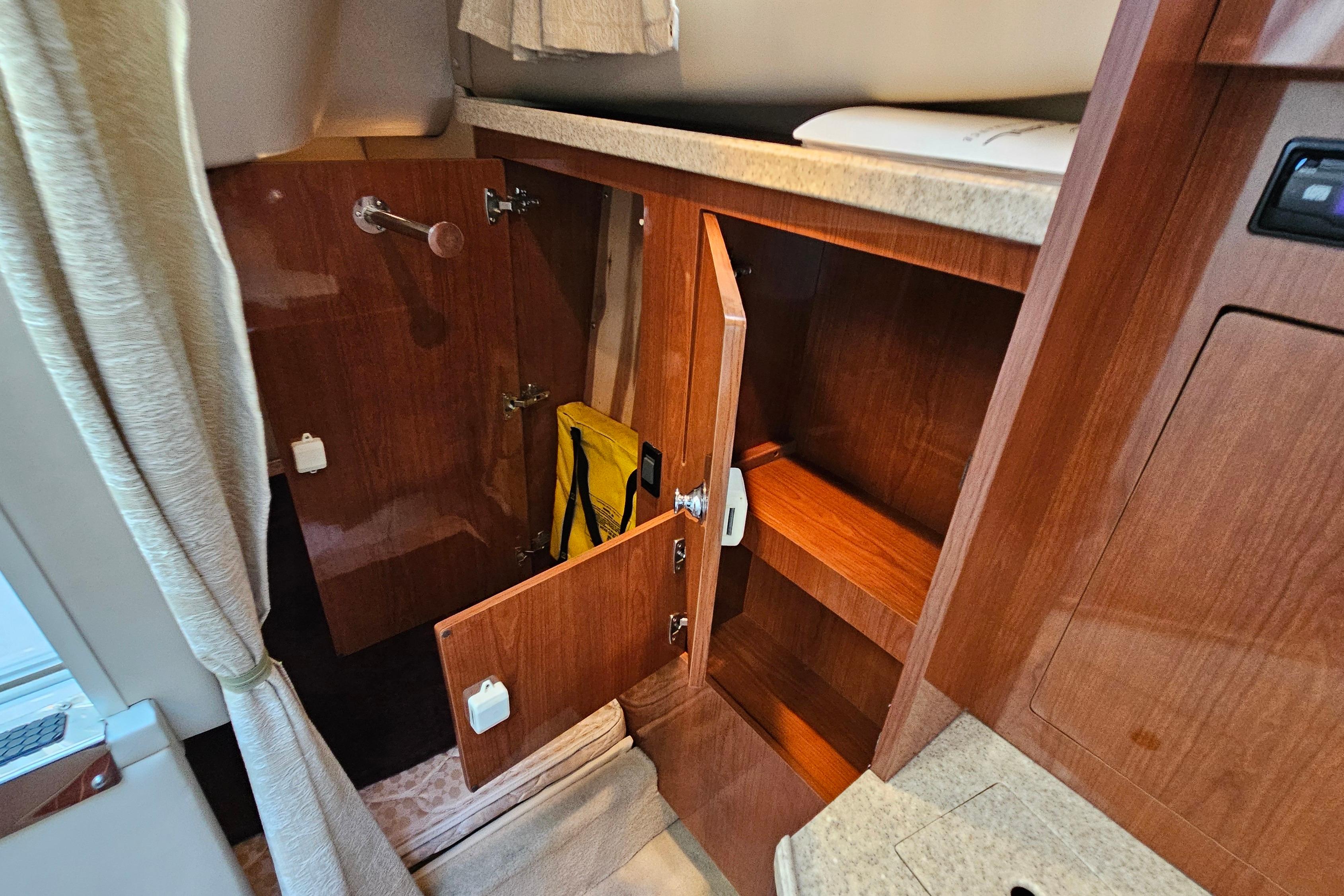 Interior storage cabinets on a 2005 Regal 3060 Window Express boat.