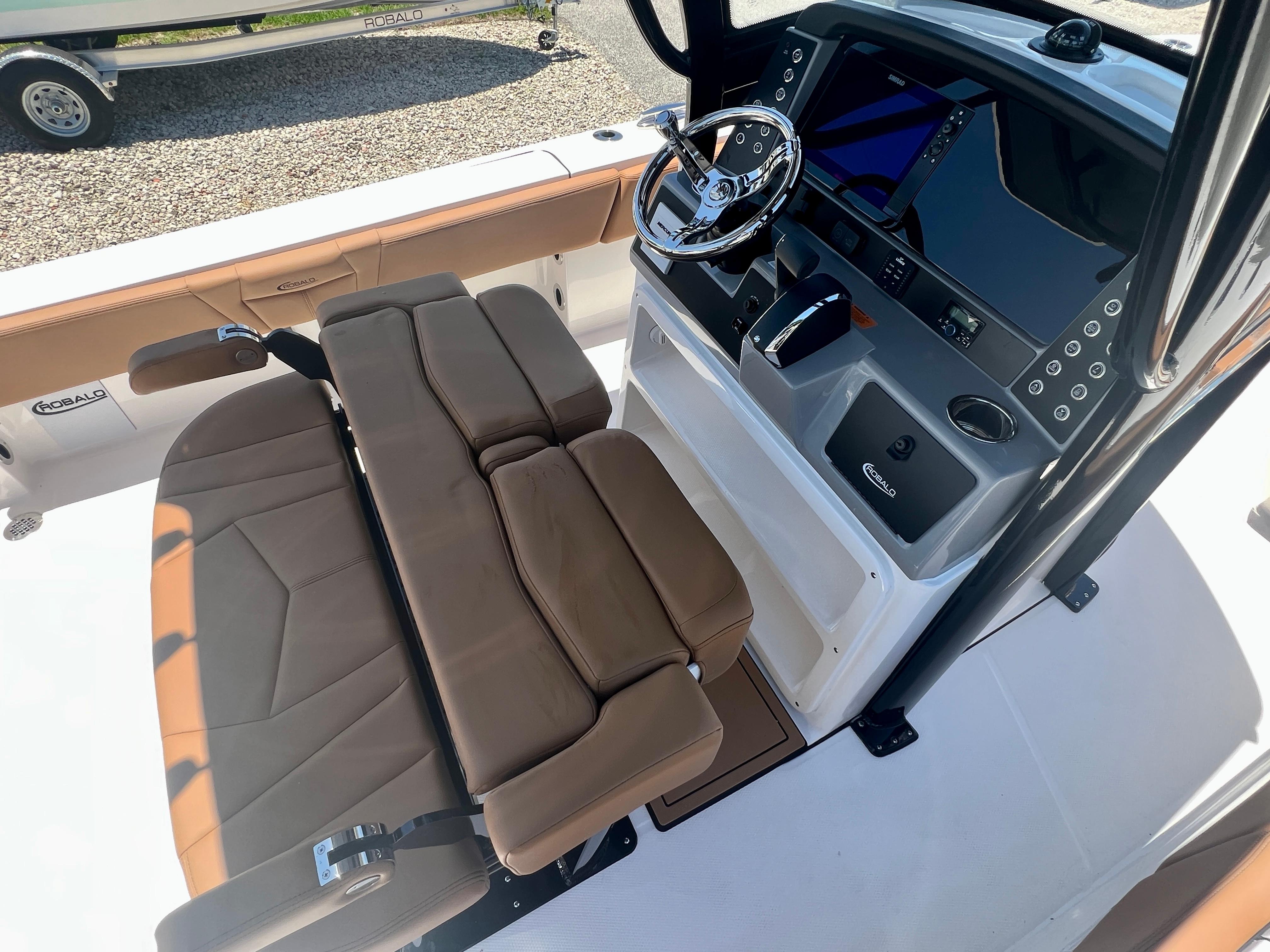 Interior view of 2025 Robalo 266 Cayman boat with helm console.