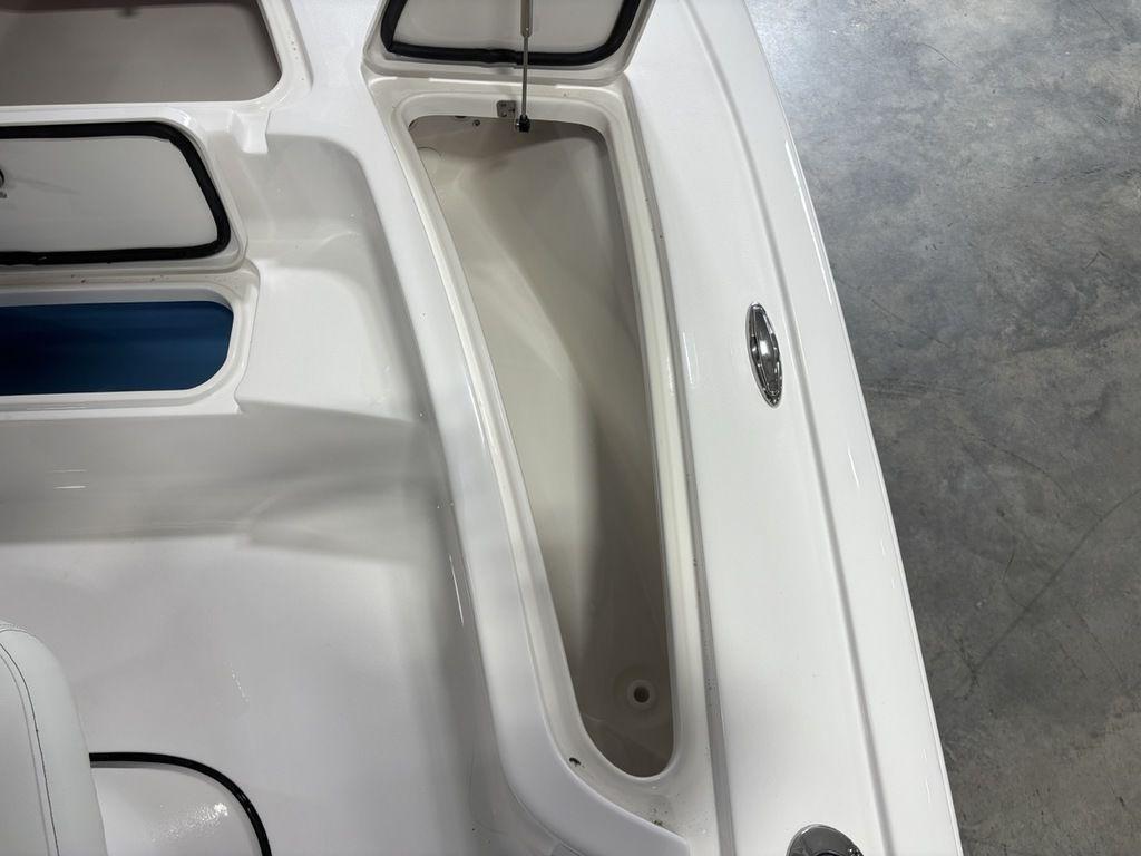 Interior view of a 2026 Tidewater 2110 BM boat, showcasing storage compartments.