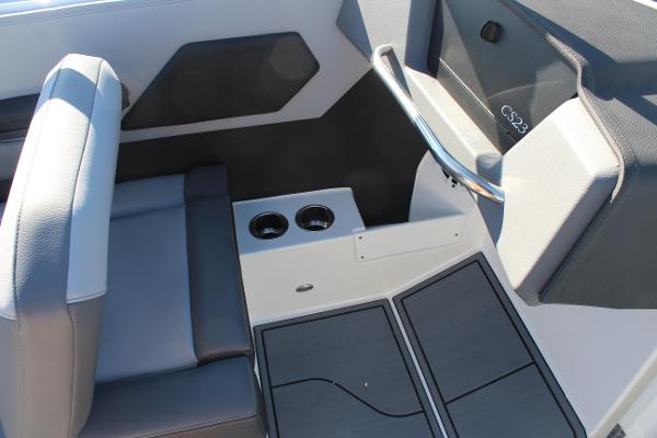 2025 Cobalt CS23 boat interior with seating and cup holders.