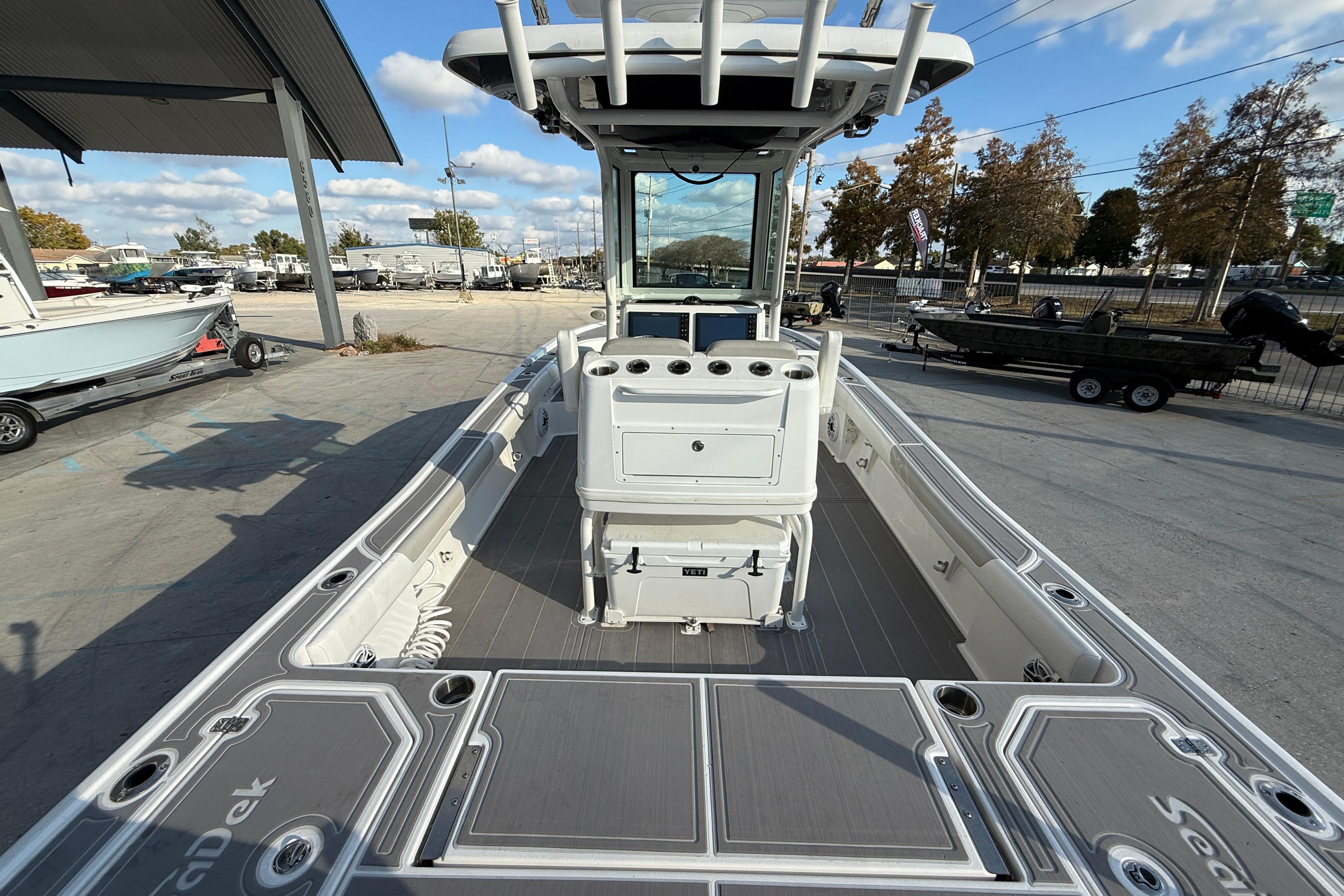 2022 Caymas 28 HB Twin boat interior with modern console and spacious deck.