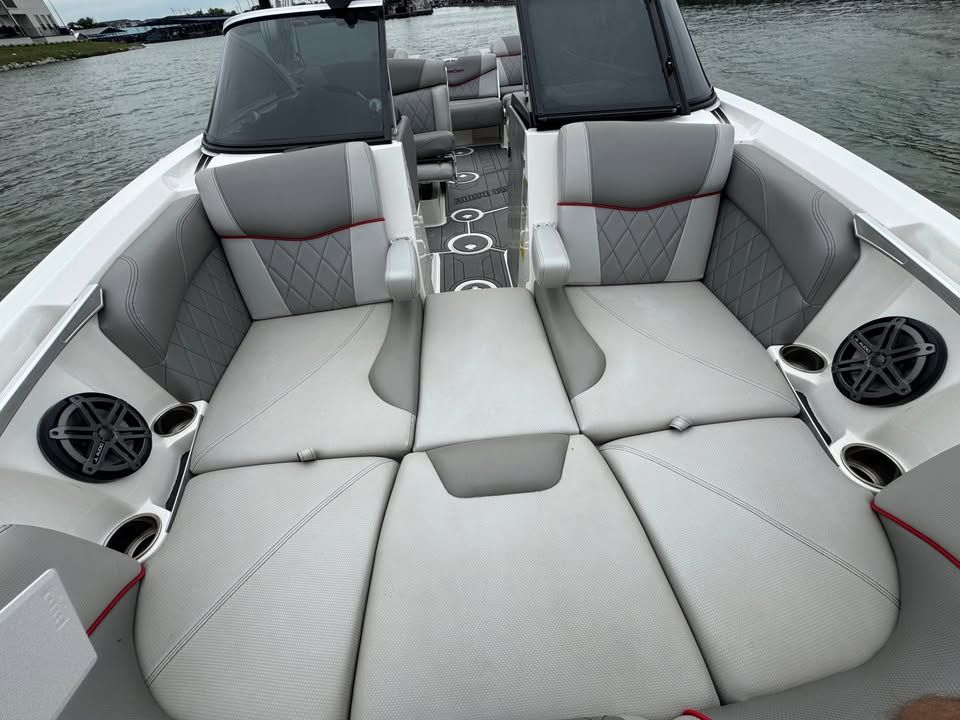 Interior of a 2015 MasterCraft X46 boat with gray upholstery.