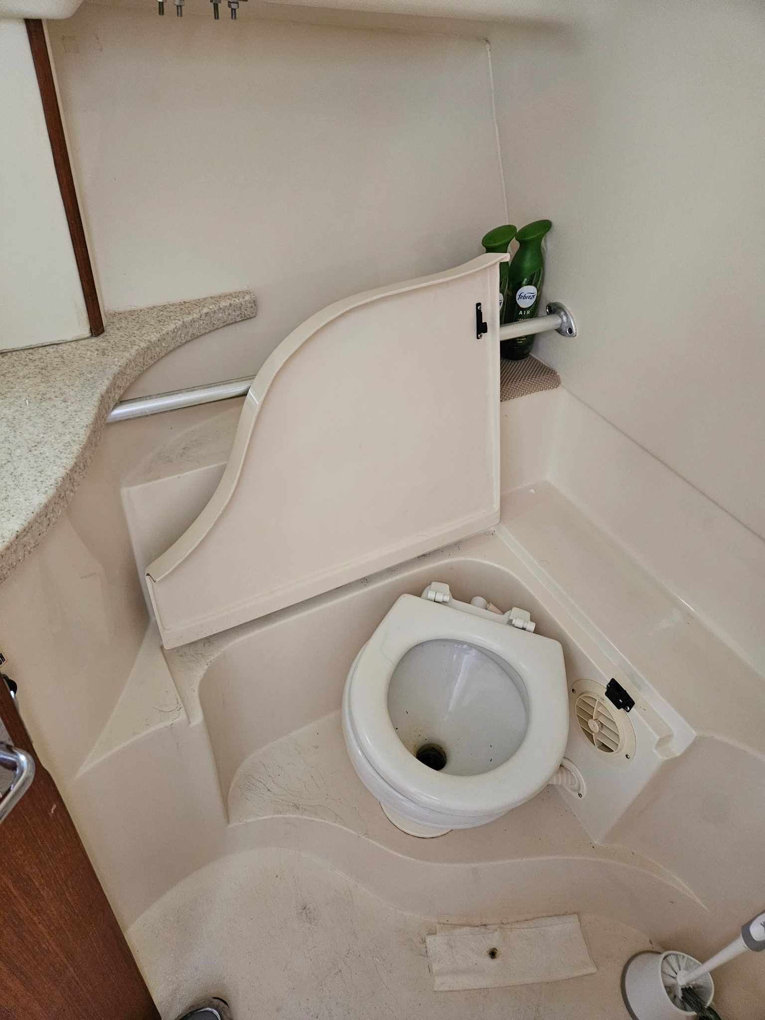 Interior of a 1999 Mainship Pilot 30 with toilet.