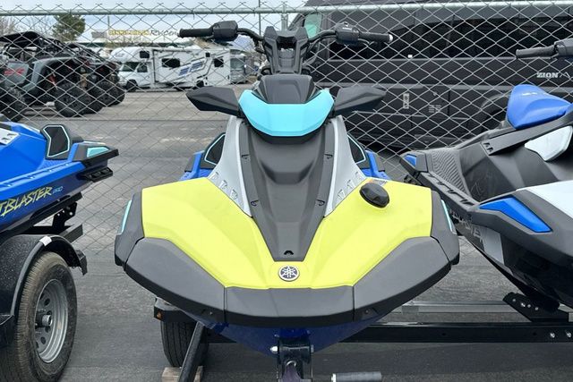 A Yamaha WaveRunner Jetblaster Pro in blue and yellow sits on a trailer.