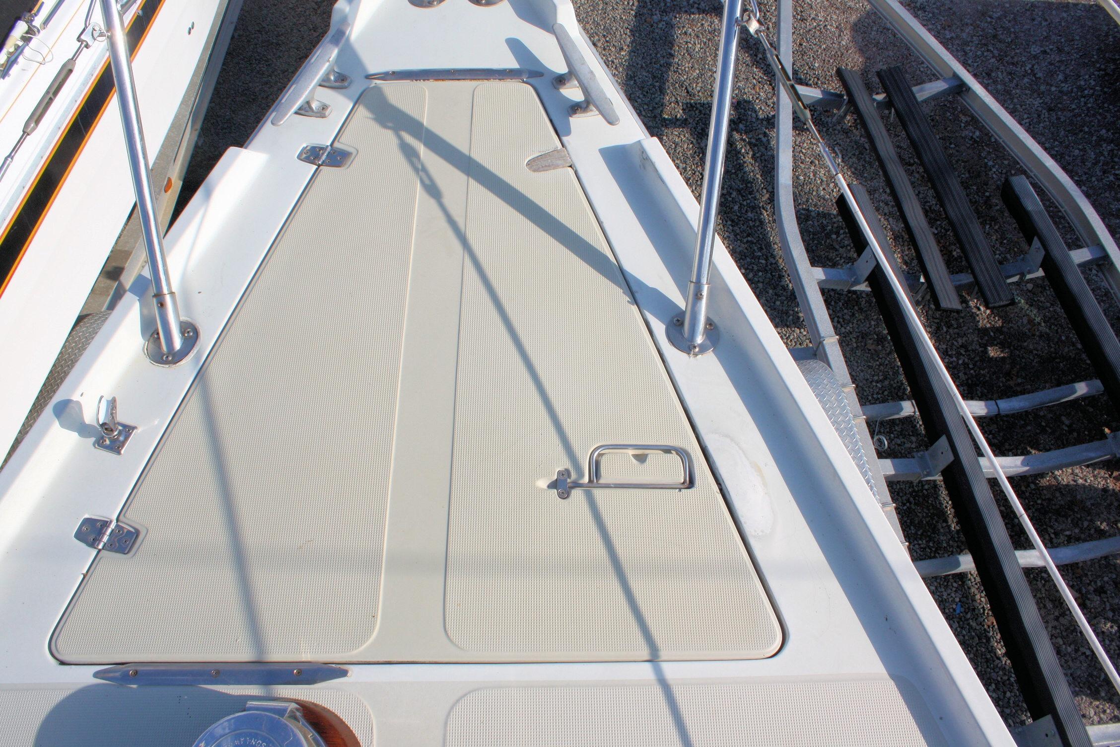 Deck of 1987 Ericson 38-200 sailboat, featuring clean lines and sturdy fittings.