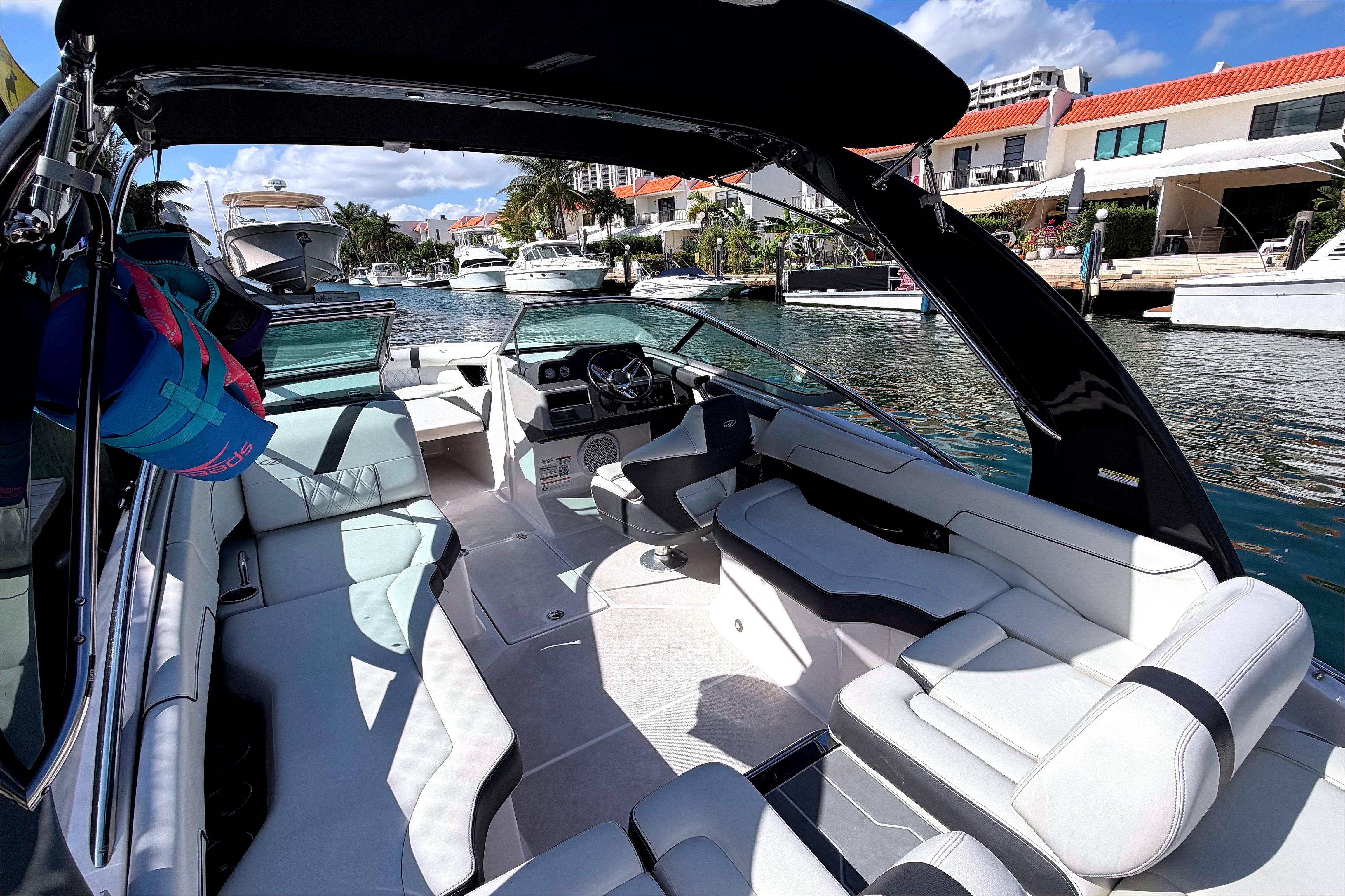 2020 Regal 2300 Bowrider boat interior with luxurious seating and waterfront view.