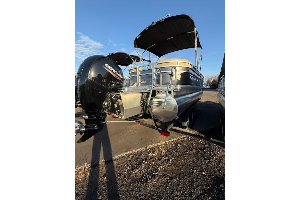 2025 Sun Tracker Party Barge 22 XP3 pontoon boat with Mercury outboard motor.